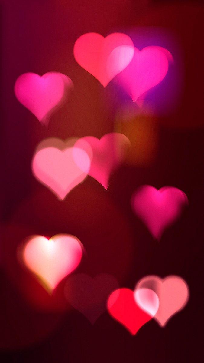Pink Heart Bokeh iPhone Wallpaper Glowing Aesthetic Pattern