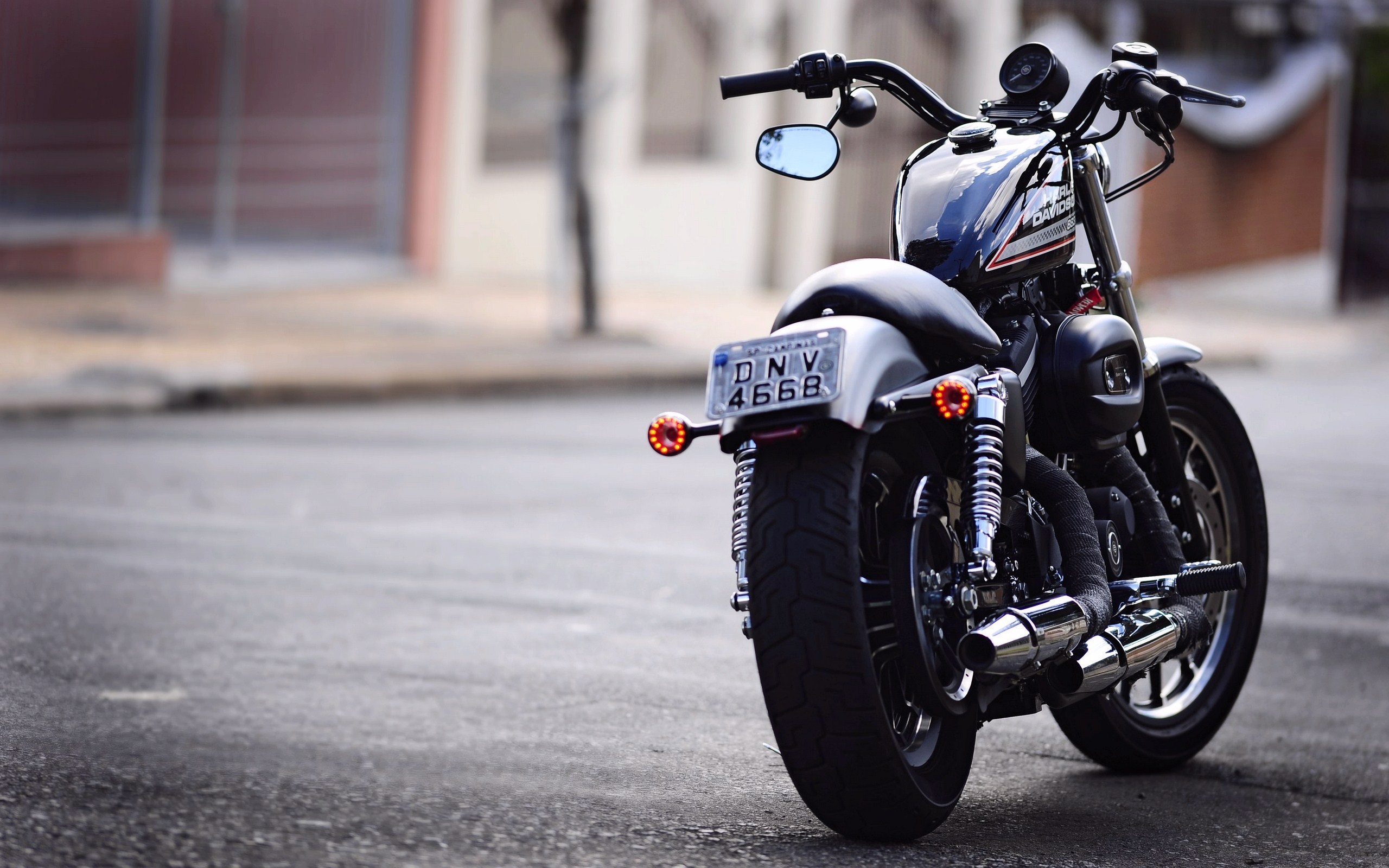 Black Harley-Davidson Motorcycle Parked on a City Street