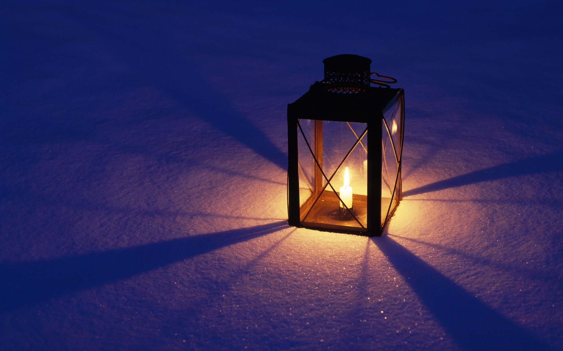 candle lamp on snowfield   Holiday Wallpapers   Hi Wallpaperscom