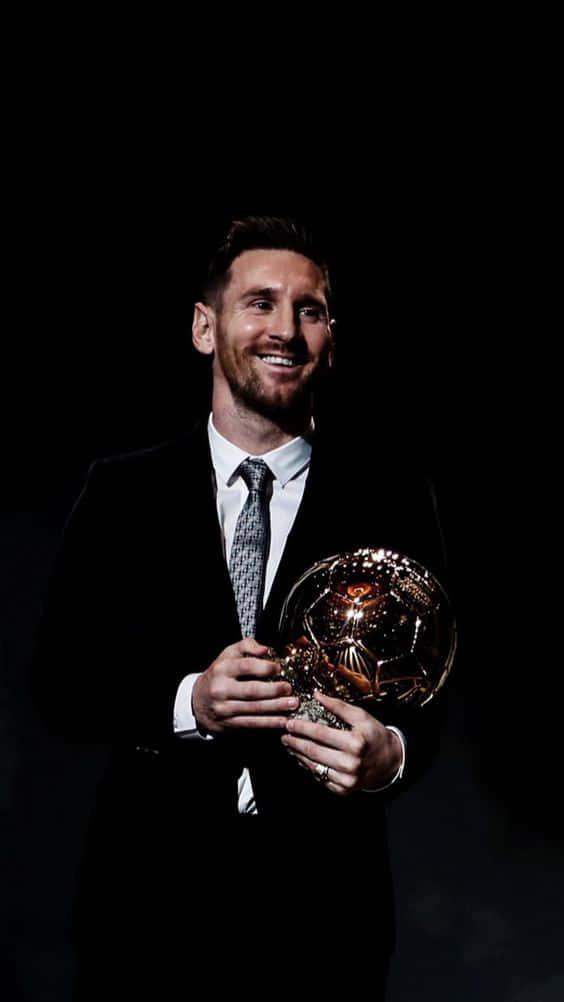 Download Messi Iphone Receiving Ballon Dor Wallpaper