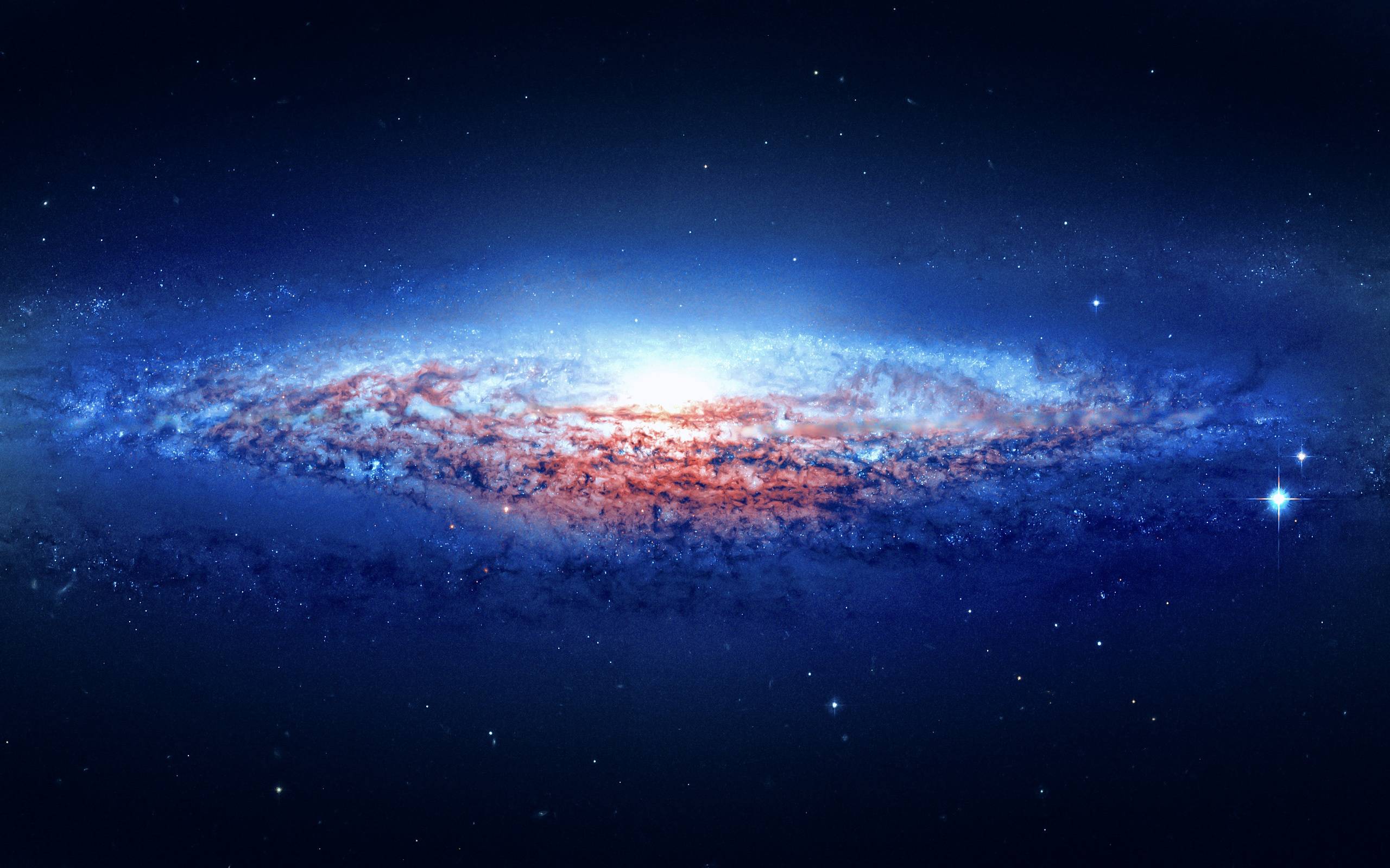 A breathtaking panoramic view of a spiral galaxy, showcasing a vibrant mix of blue, purple, and orange hues, ideal for a captivating iPhone wallpaper