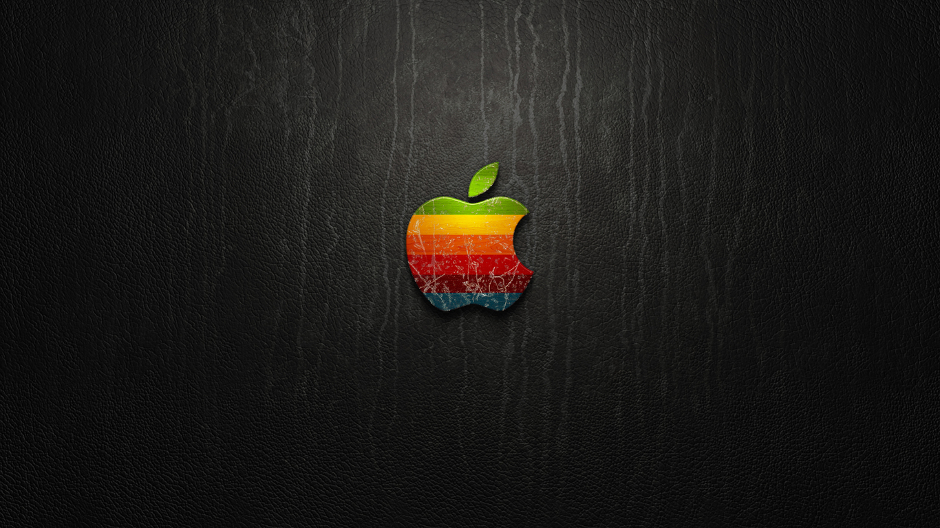 Colorful Apple On Leather Widescreen Wallpaper