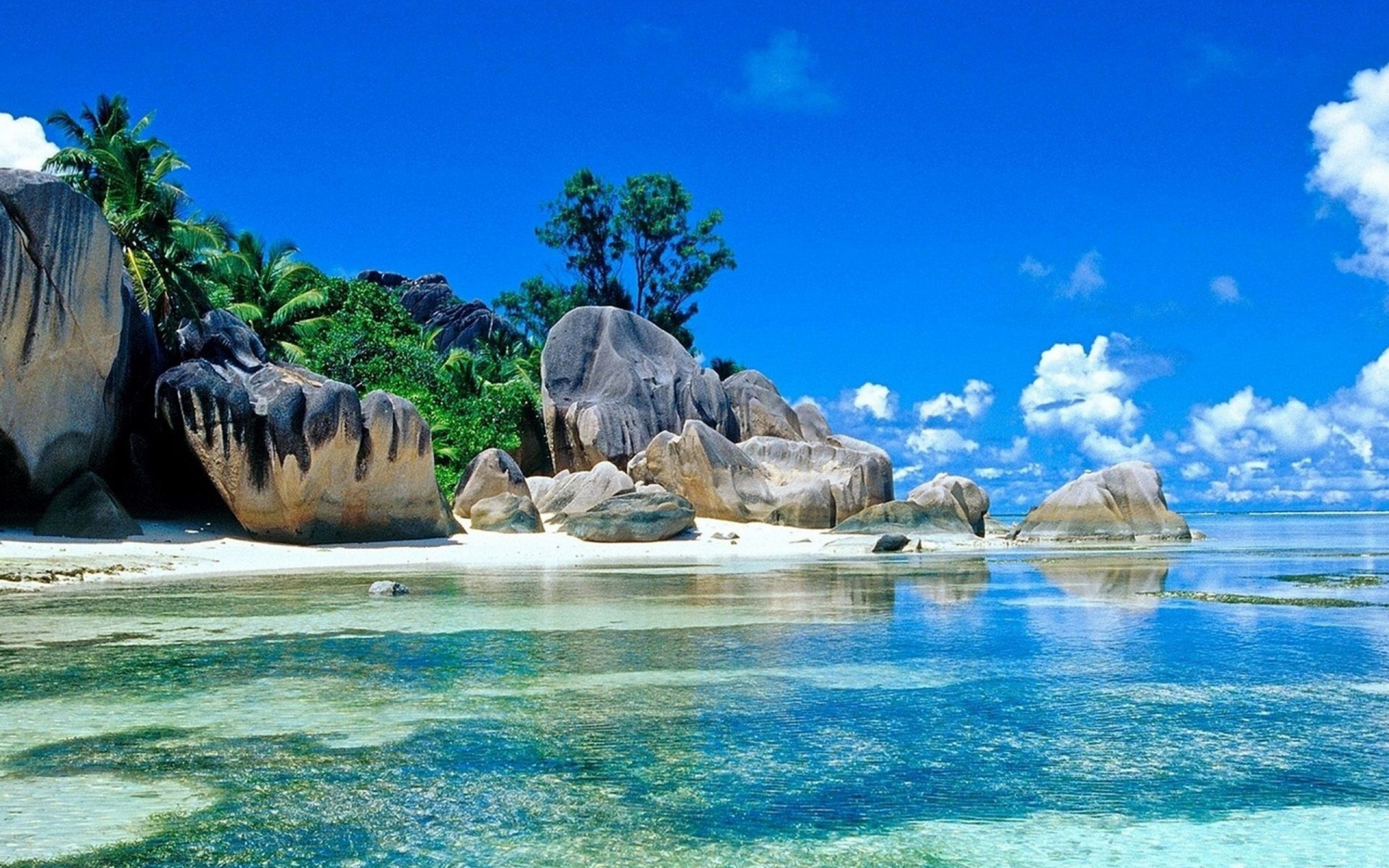 Download HD Sea Tropical Island Stones Sky Blue Summer Wallpaper 3840x2400