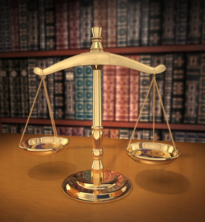 Brass Scales Of Justice On A Desk Showing Depth Field Books Behind