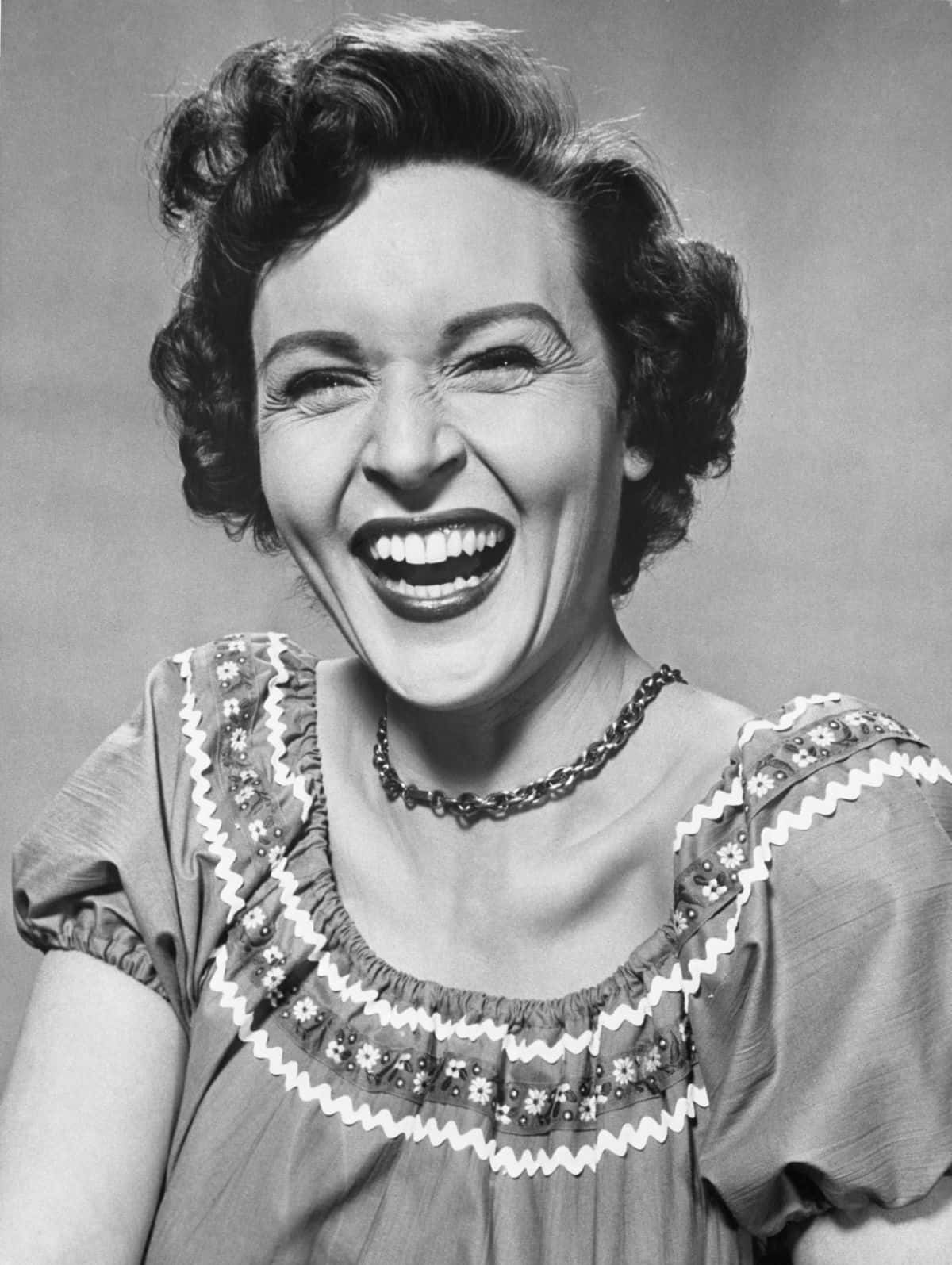 Betty White Posing Gracefully In A Glamour Shot Wallpaper