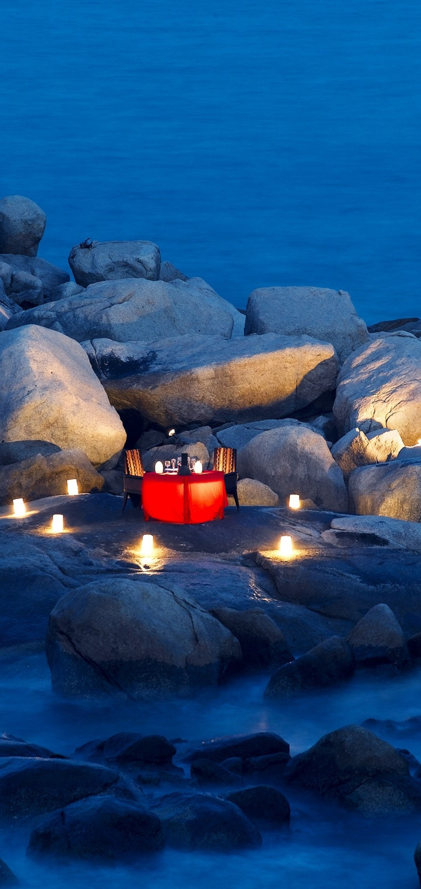Download 1440x3040 Romantic Dinner Table Dusk Rocks Coast Sea