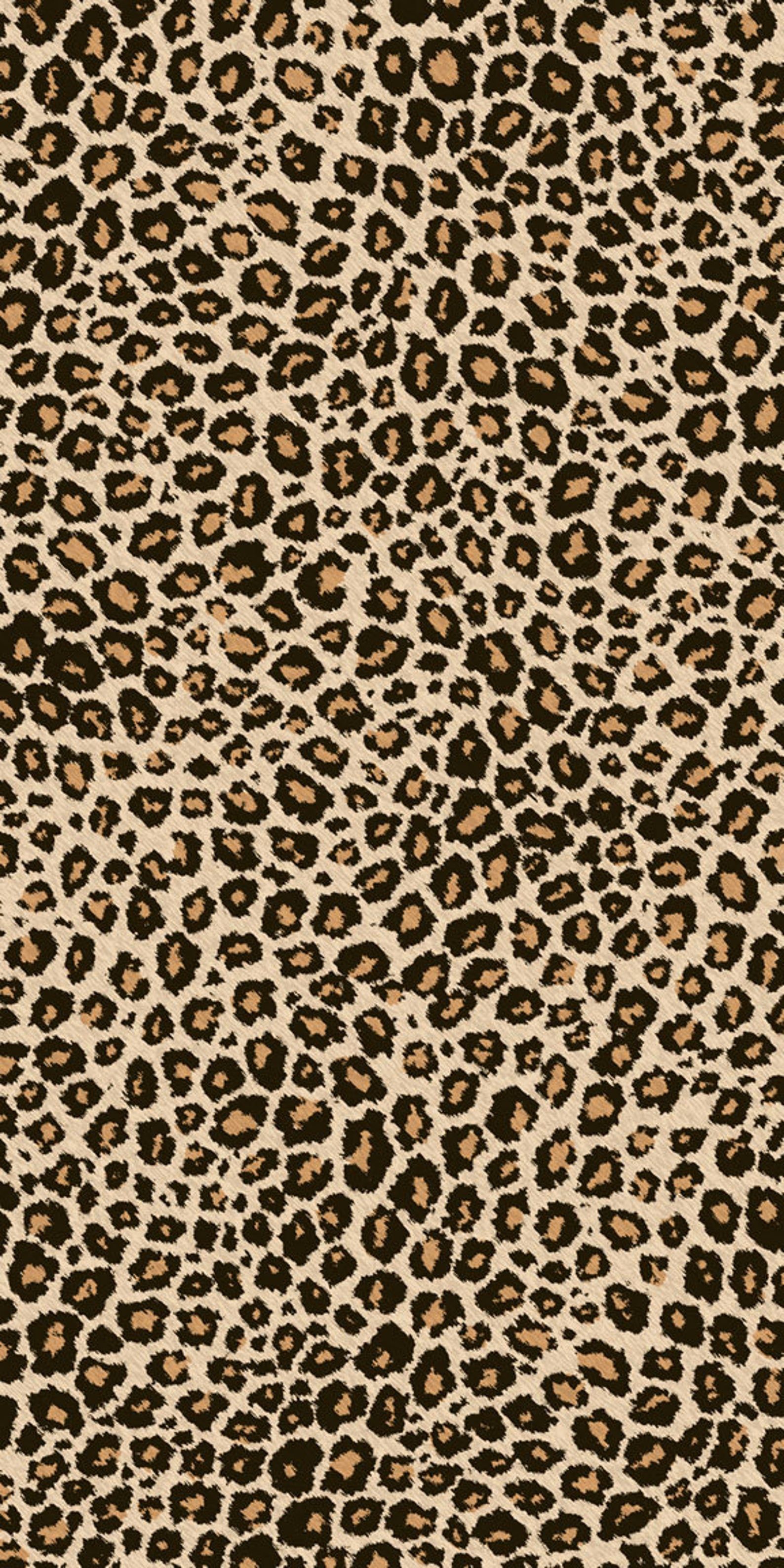 A seamless pattern of leopard spots against a light brown background creates the look of glitter leopard fur