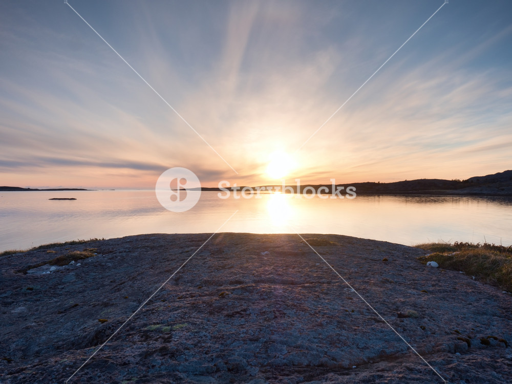 Smooth Evening Sea Between Granite Rocks Peaceful Background With