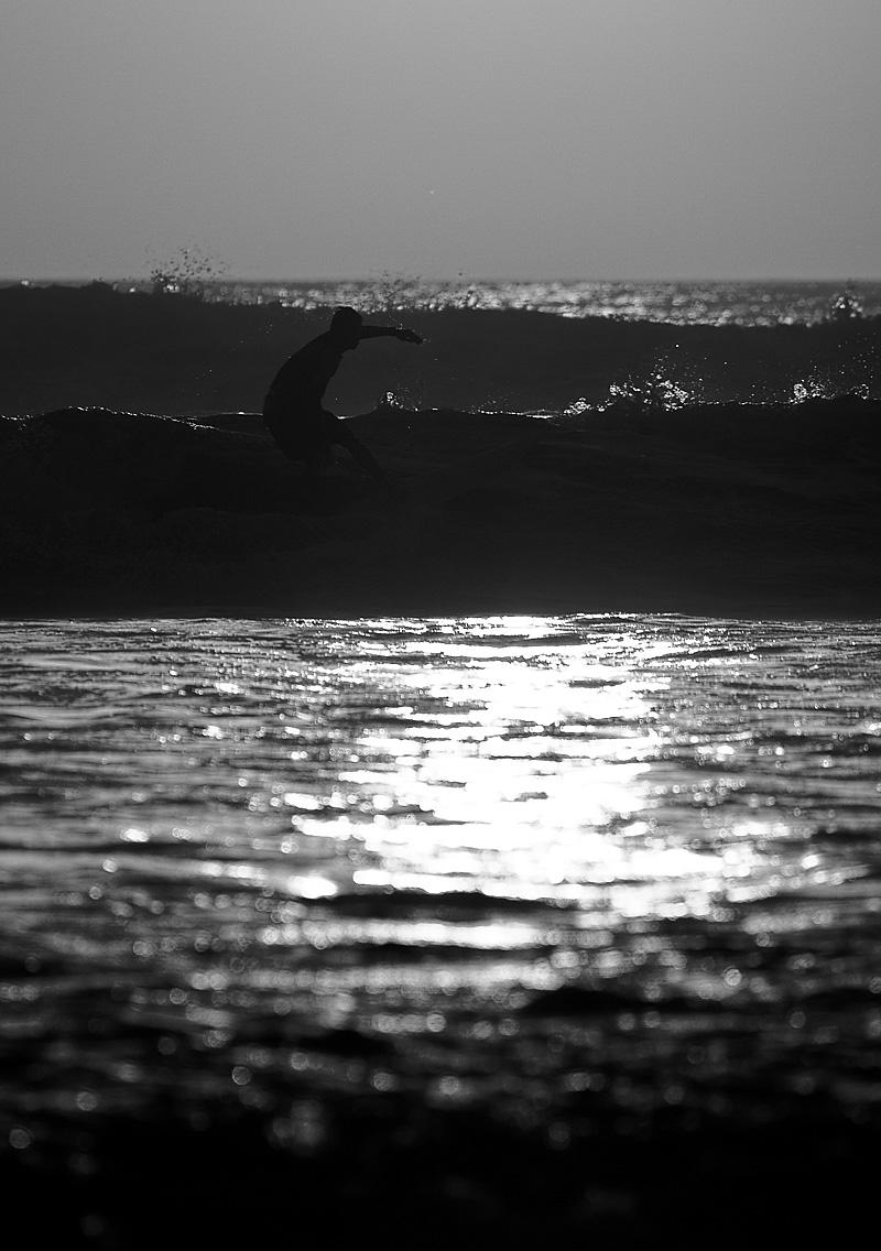 Backside Cutback At Kuta Beach In Bali A Local Boy Rides