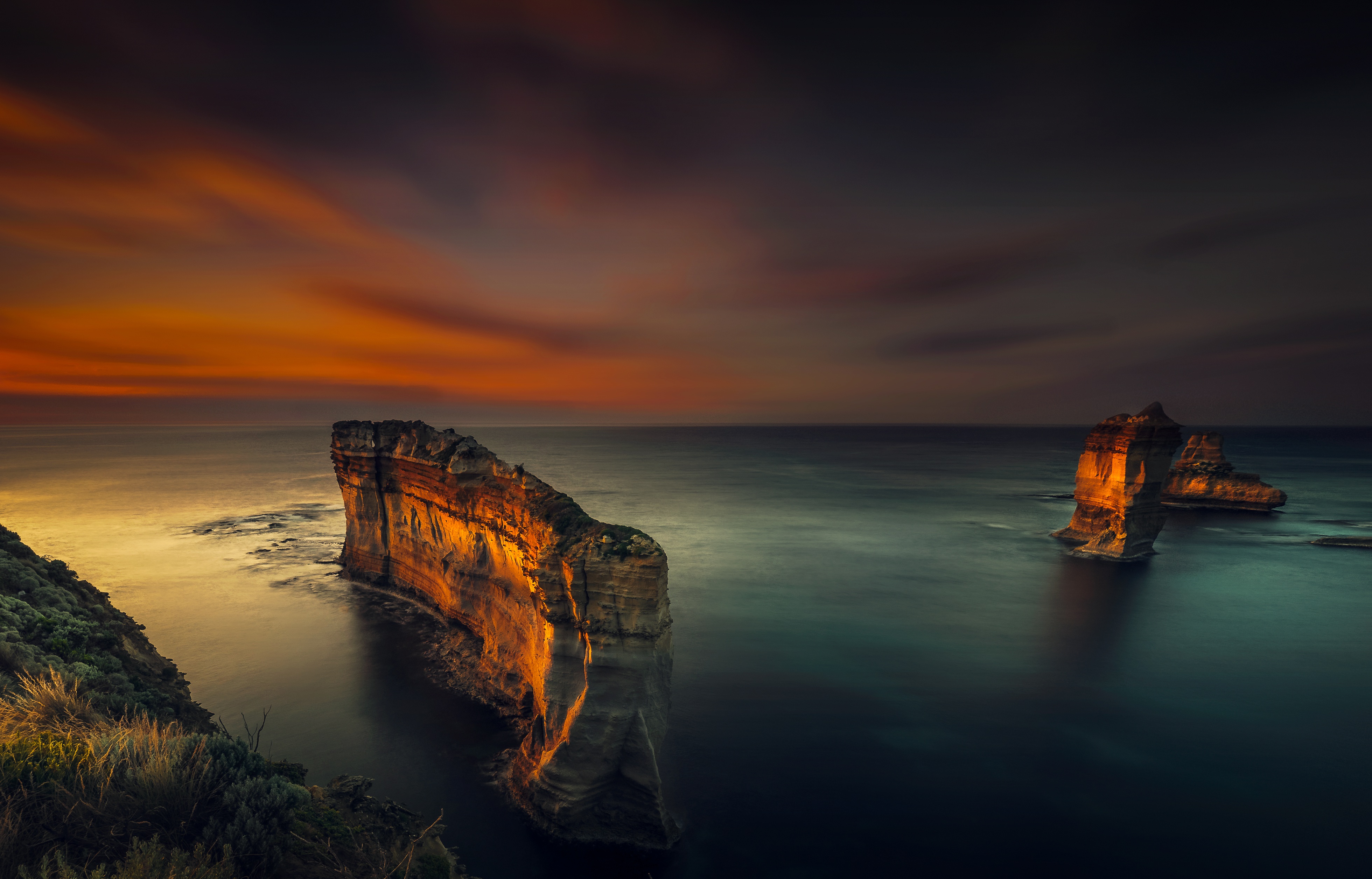 Majestic Cliffside At Dusk Wallpaper