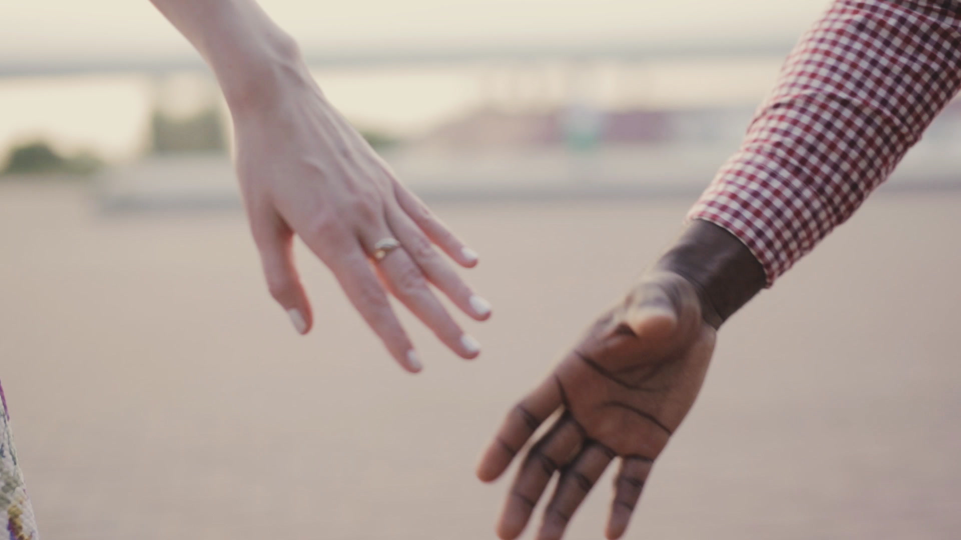 Two Interracial Lovers Joining Hands Stock Video