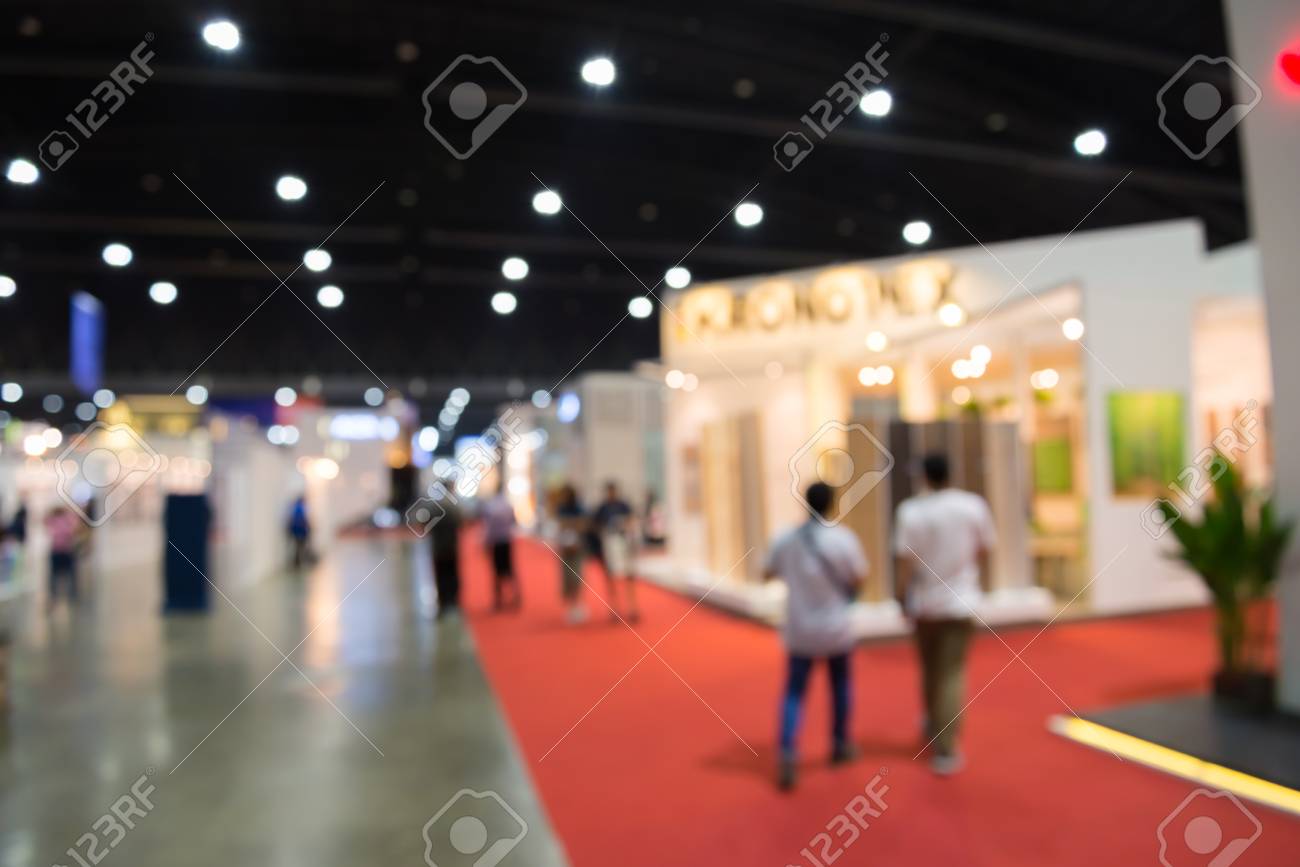 Abstract Blur People In Trade Show Expo Background Stock Photo