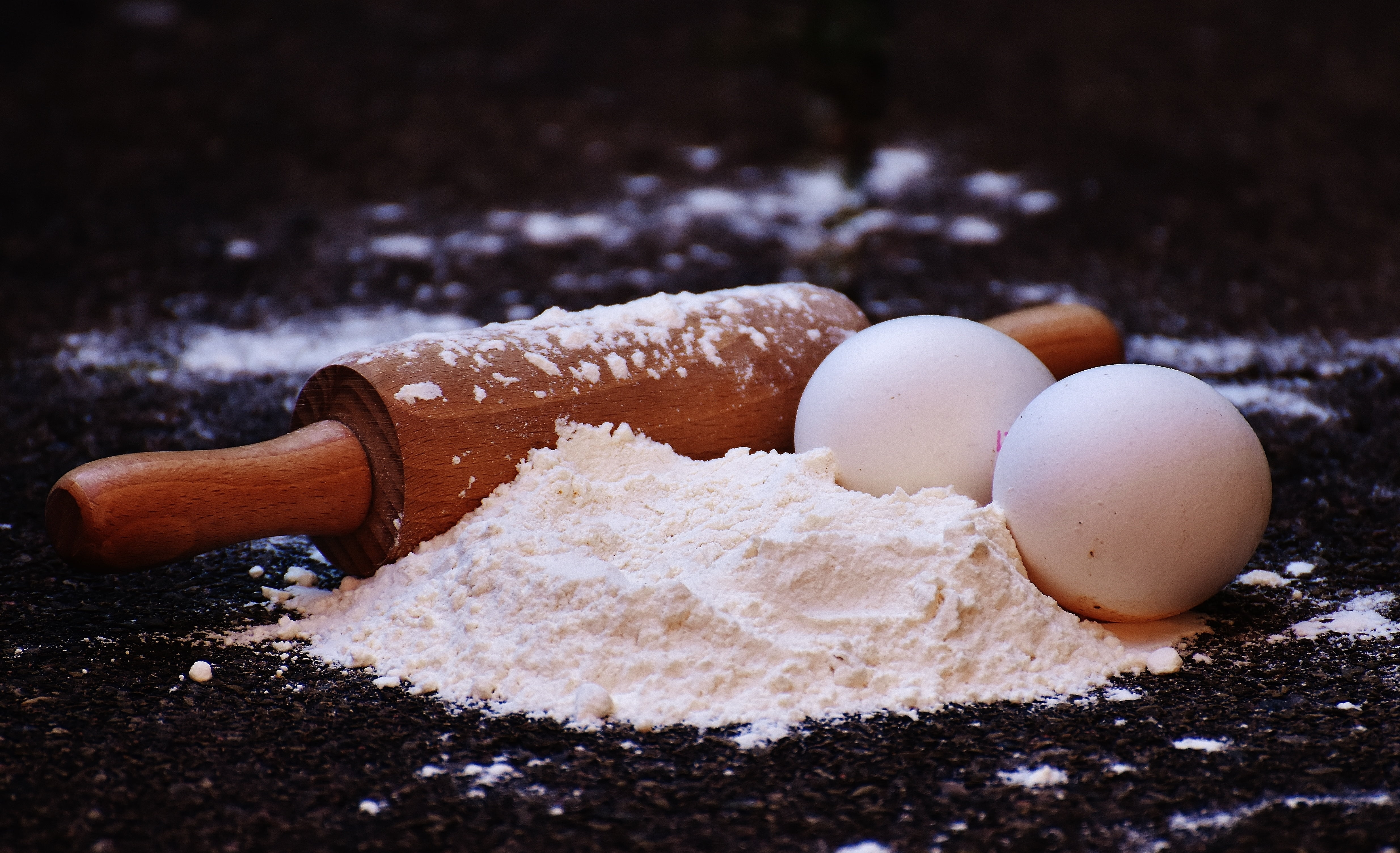 Brown Wooden Rolling Pin Beside Two White Eggs And Flour HD