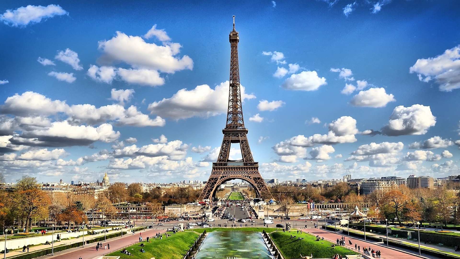 Eiffel tower on background of clouds in Paris France wallpapers and