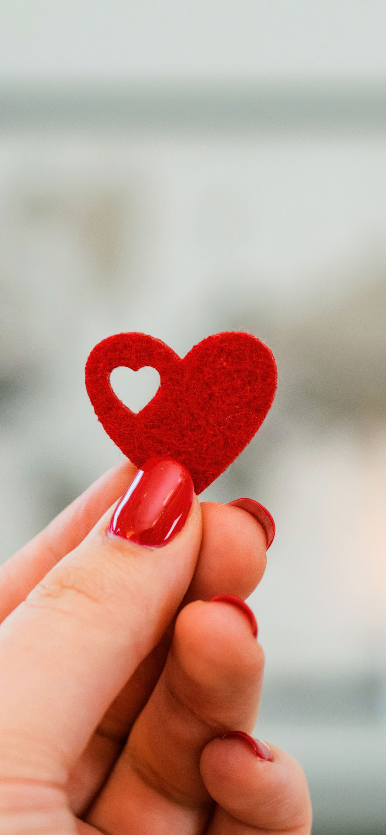 Red Heart In Woman S Hand 5k Wallpaper