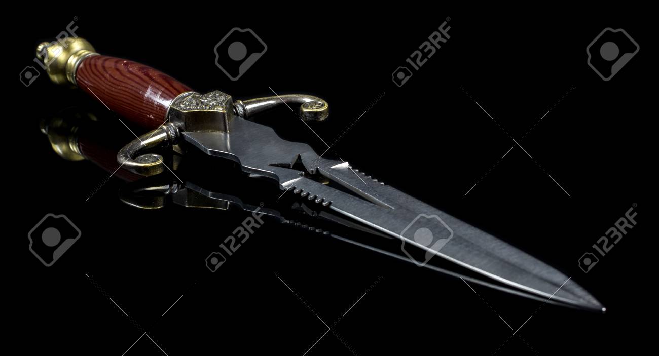 Free download Dagger On Black Background Stock Photo Picture And