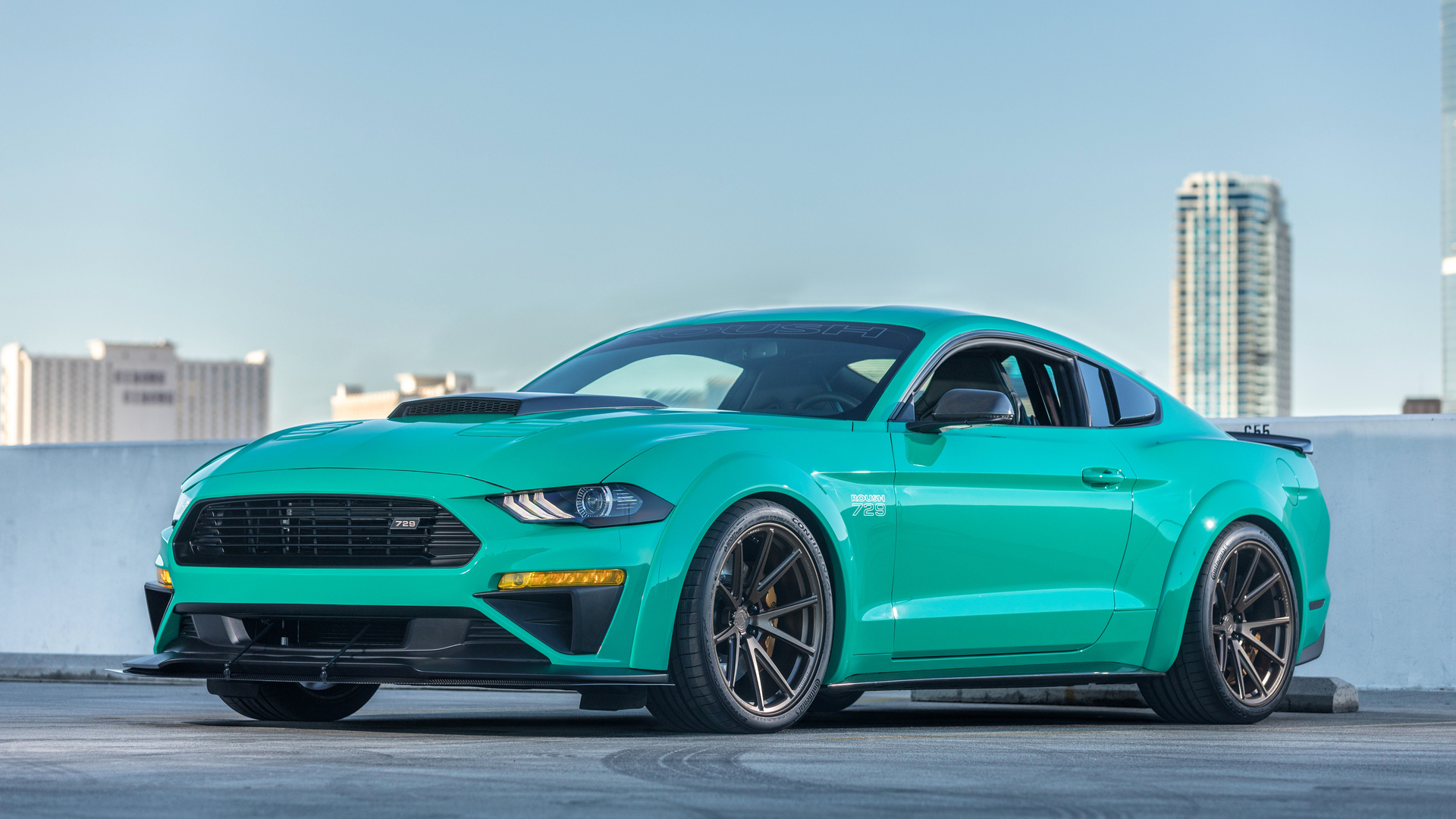A Stunning Teal Ford Mustang GT500 on a Rooftop Parking Lot