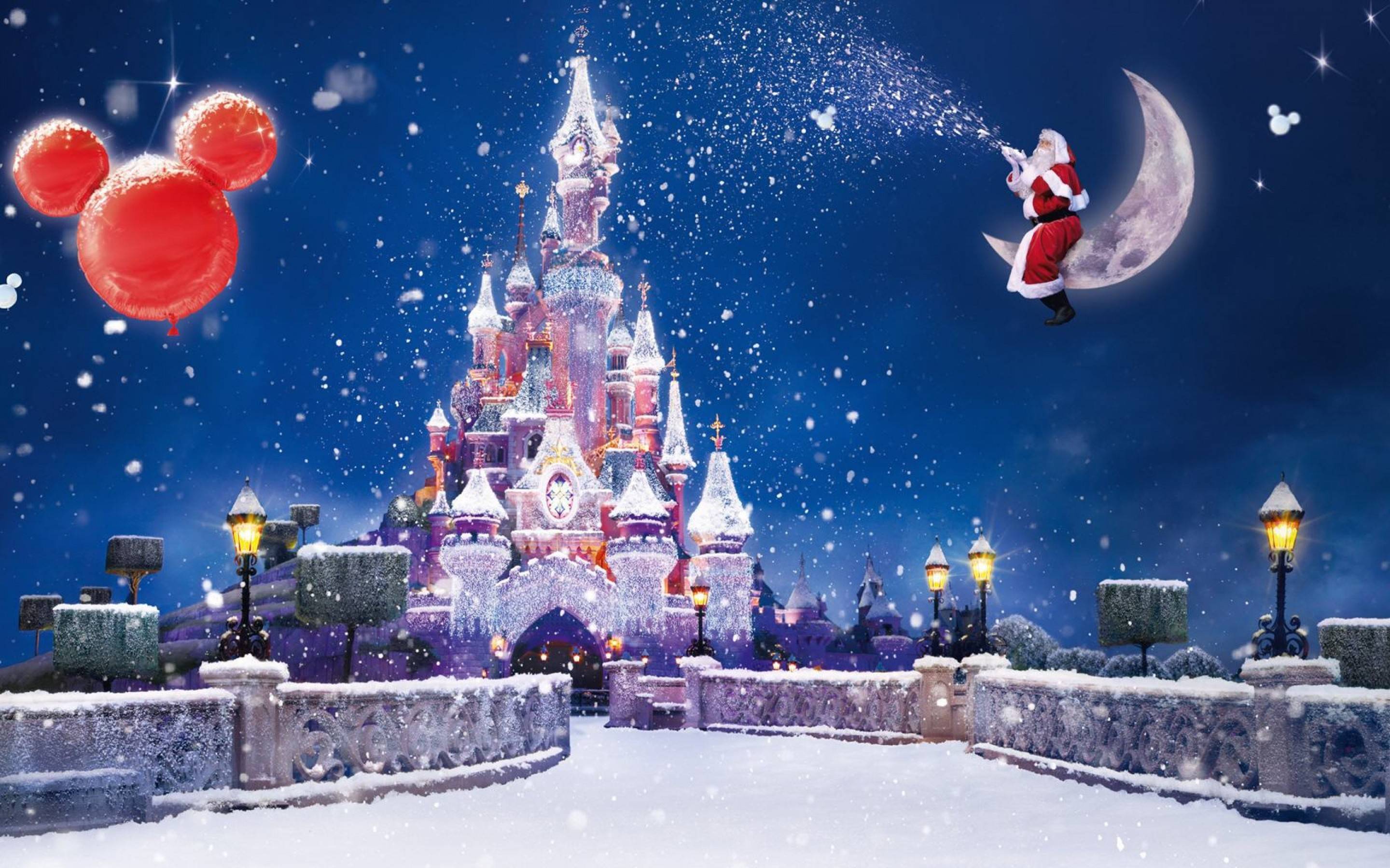 A Christmas scene at a Disney park, featuring a snow-covered castle, Santa Claus on a crescent moon, and Mickey Mouse balloon, with festive lighting and falling snow