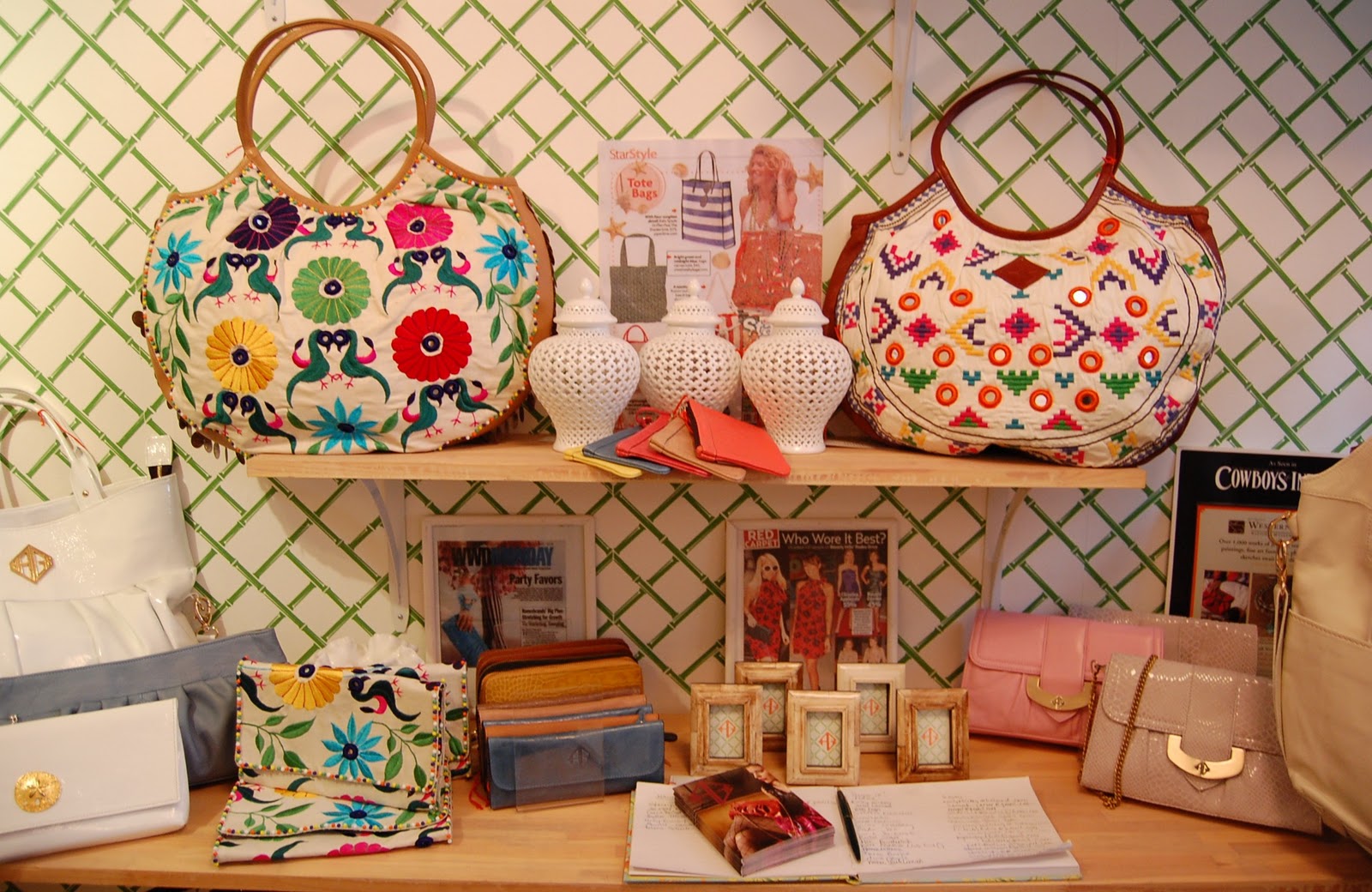 clutch and hobos and of course the trellis wallpaper in the store
