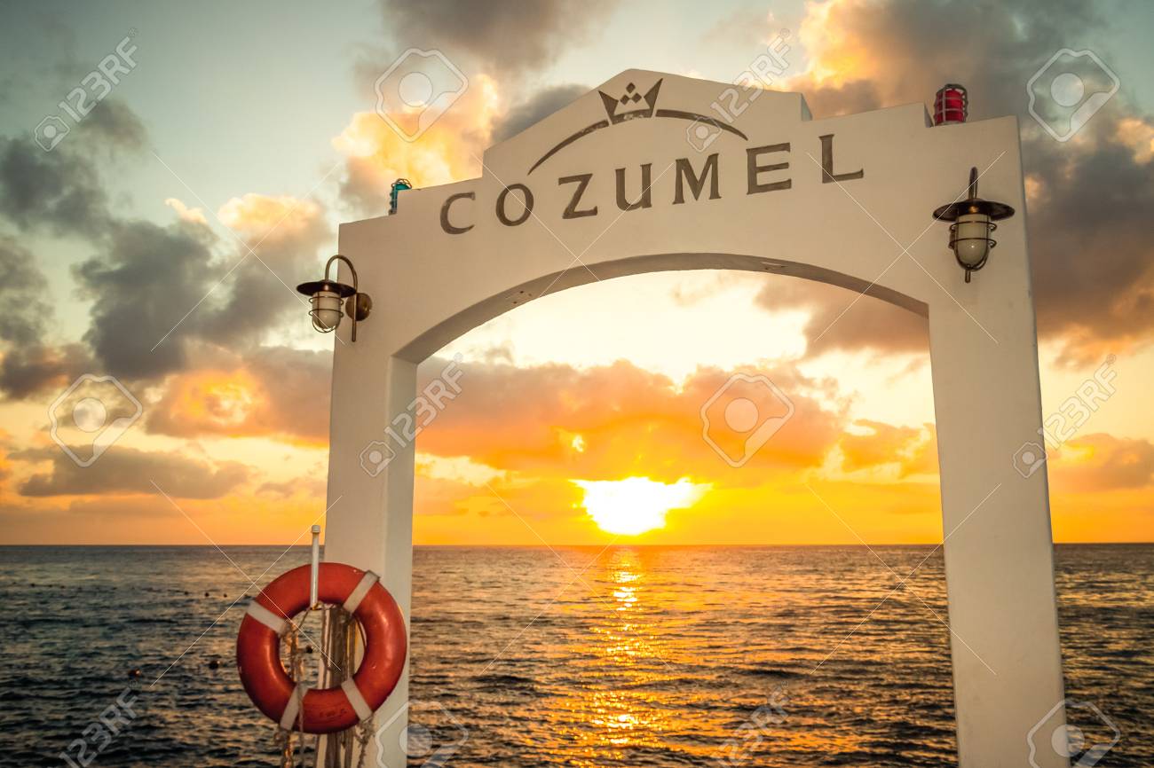 Pier On Cozumel With A Crusise Ship In The Background Stock