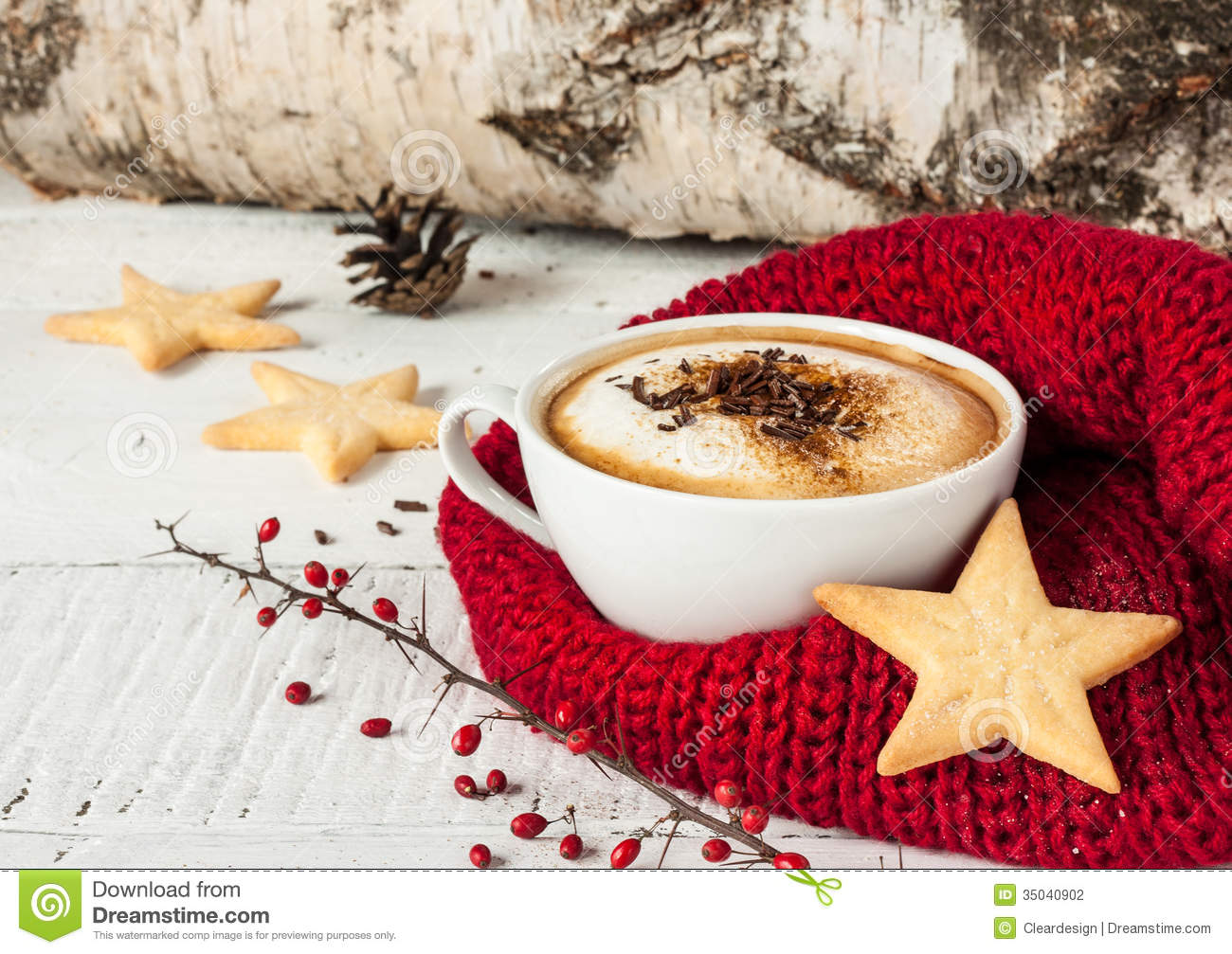 Winter Cappuccino Coffee In A White Cup With Star Shaped Christmas