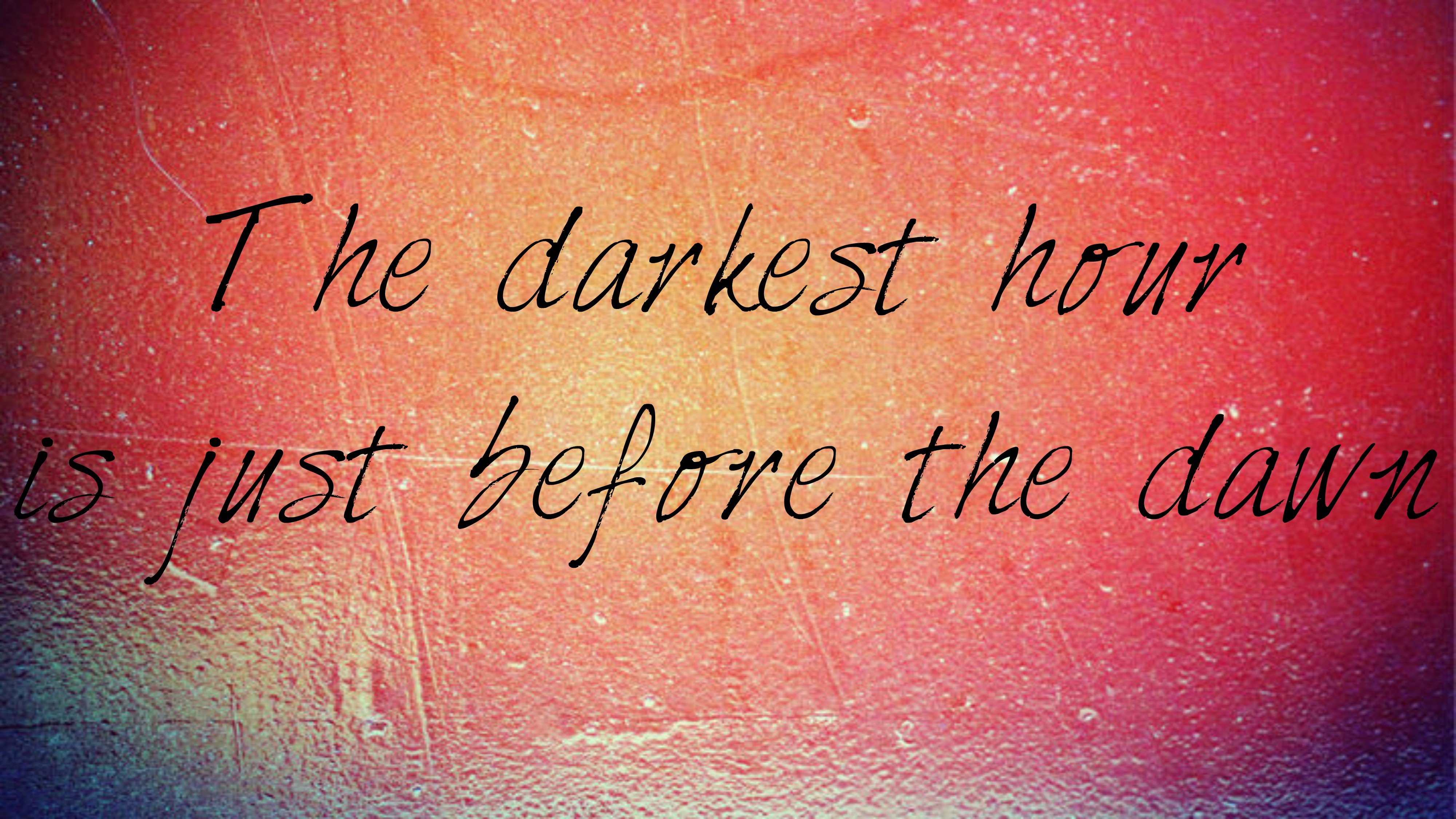 Motivational quote on a colorful textured background: 