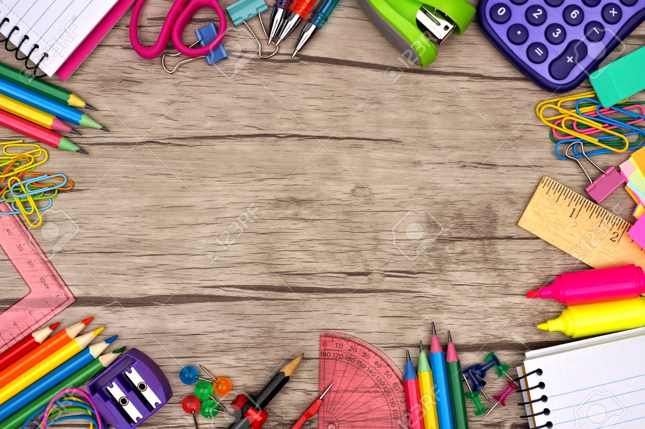 School Supplies Frame Against A Rustic Wooden Background Stock