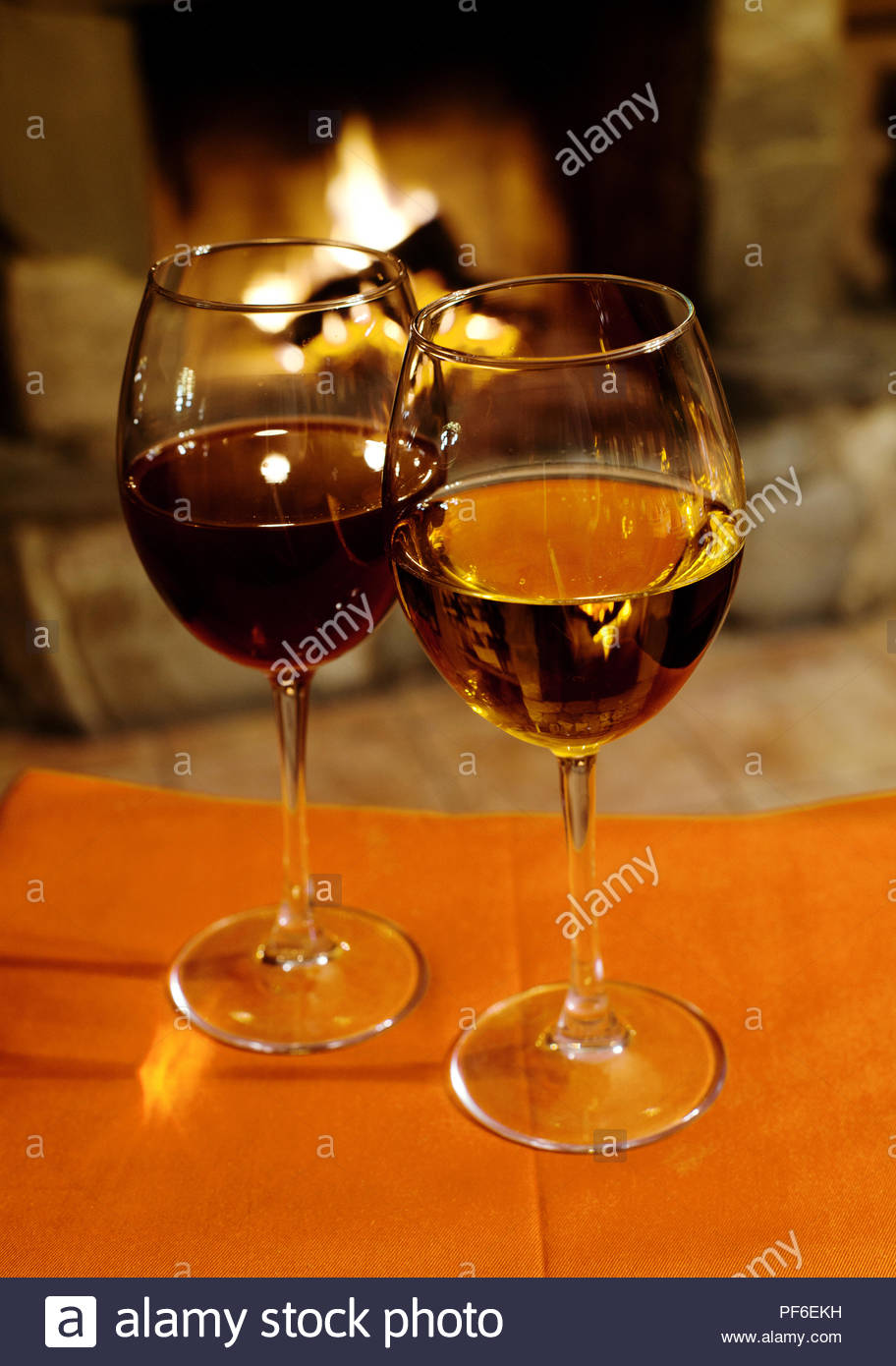 Two Glasses Of Red White Wine Fireplace Chimney Background