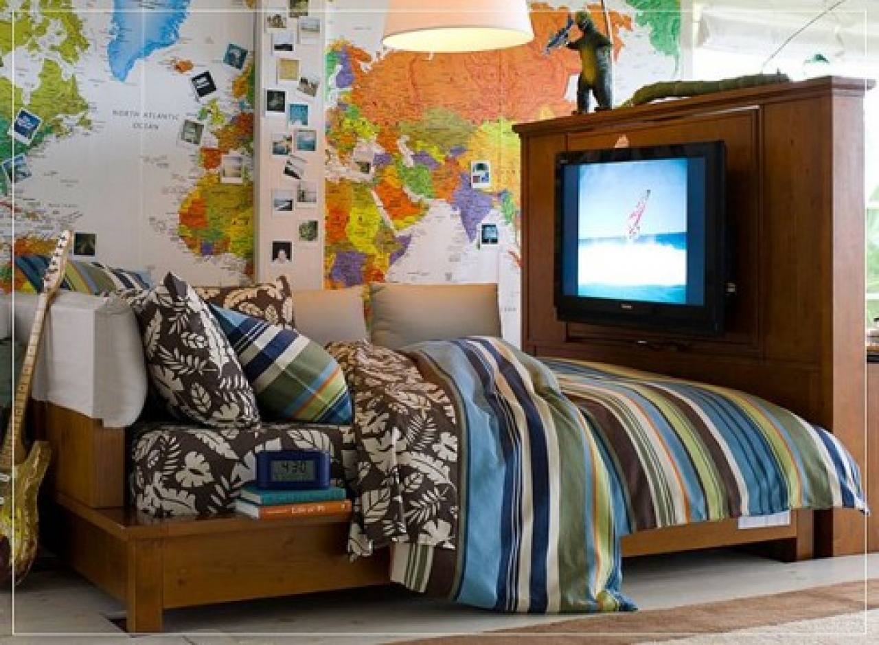 Teen boys hobby room with map wallpaper