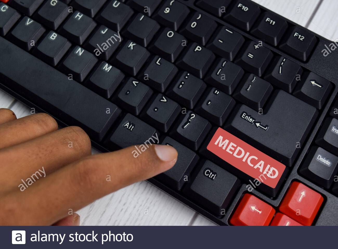 Free download Medicaid isolated on laptop keyboard background Stock