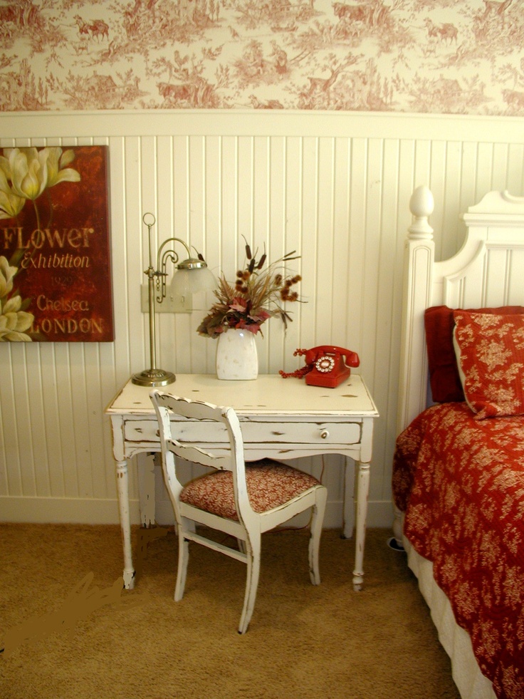 red and white decor love the white wainscoting and toile wallpaper