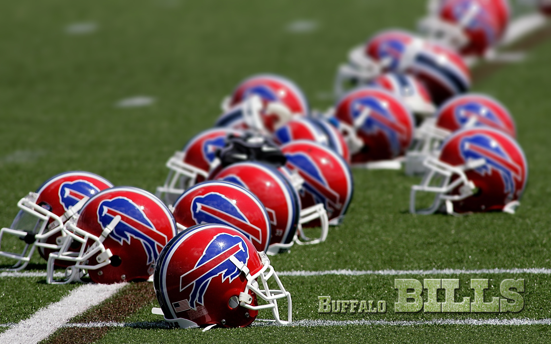 Nfl Buffalo Bills Helmets On The Football Field Grass Wide