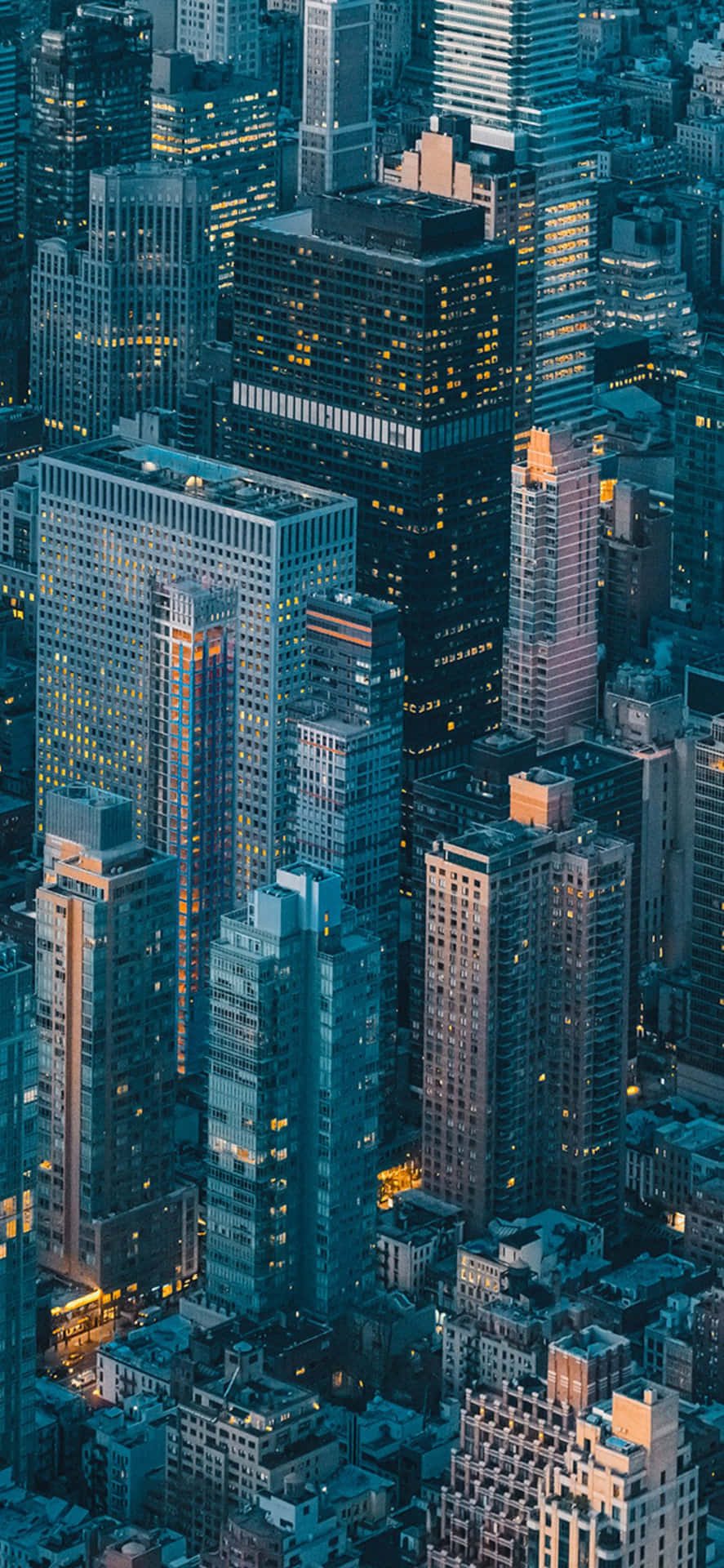 Exploring The Sights Of New York Atop Empire State Wallpaper