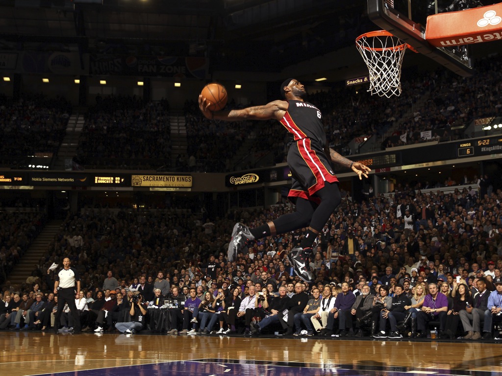 Lebron James Of The Miami Heat Dunks Ball During Their Game
