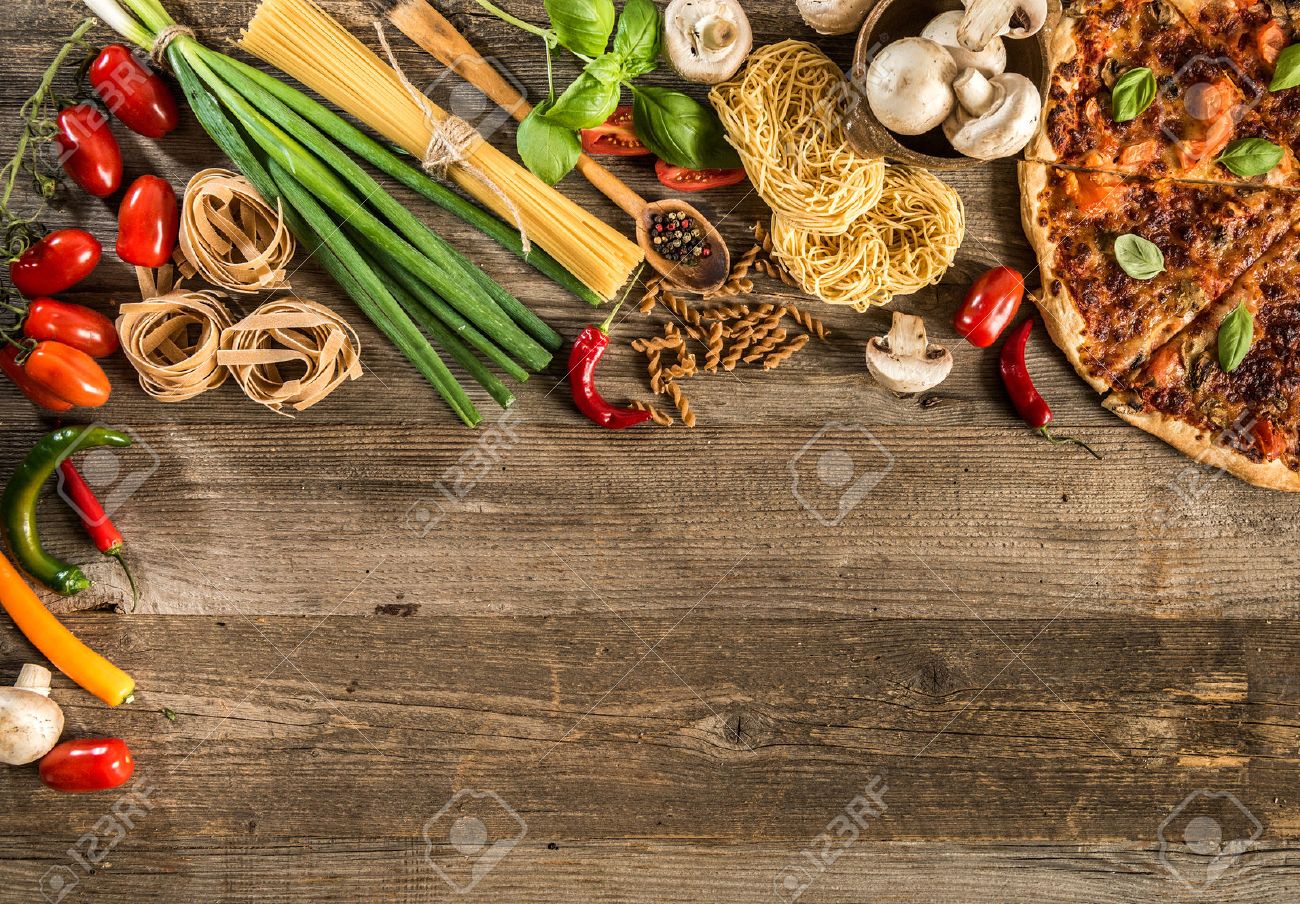 Italian Food Background With Pizza Raw Pasta And Vegetables
