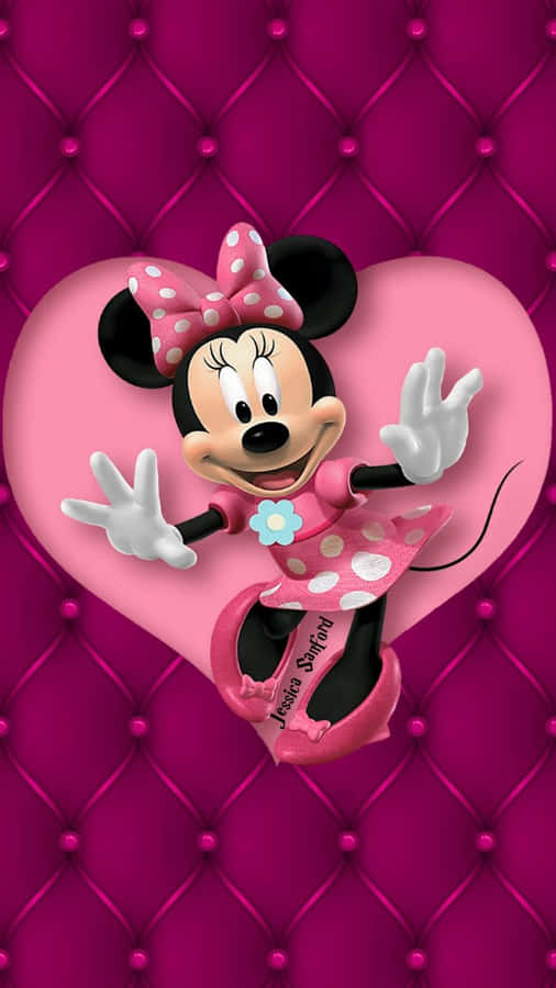 Minnie Mouse In Her Classic Pink Outfit Wallpaper