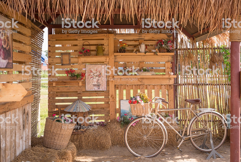Bicycle In Vintage Style At Decorative Cottage Background Stock