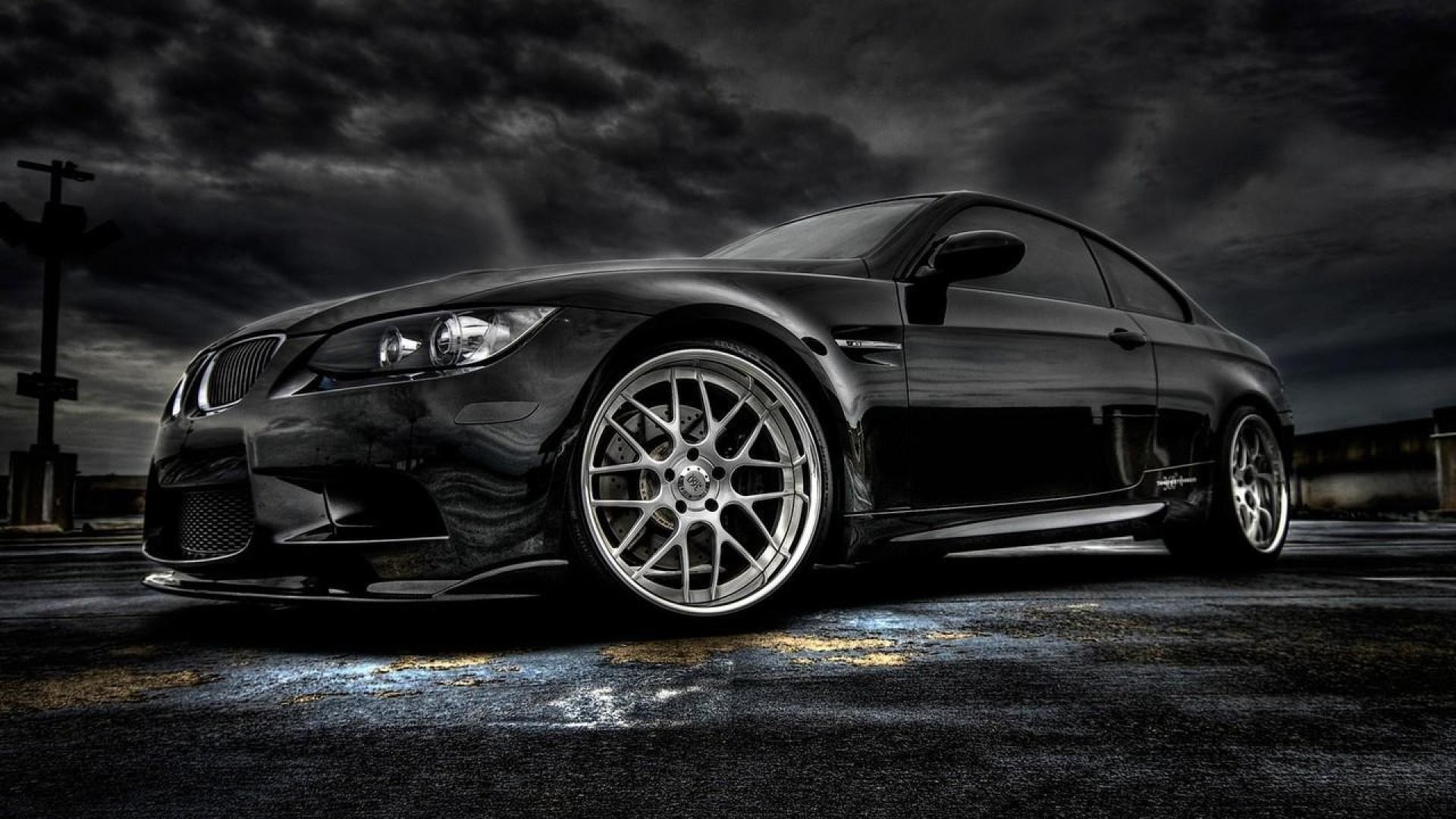 Sleek Black BMW M3 Coupe on Dark Asphalt