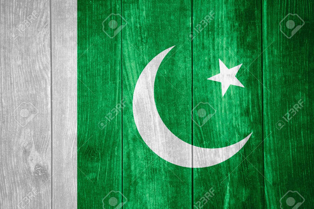 Flag Of Pakistan Or Pakistani Banner On Wooden Background Stock
