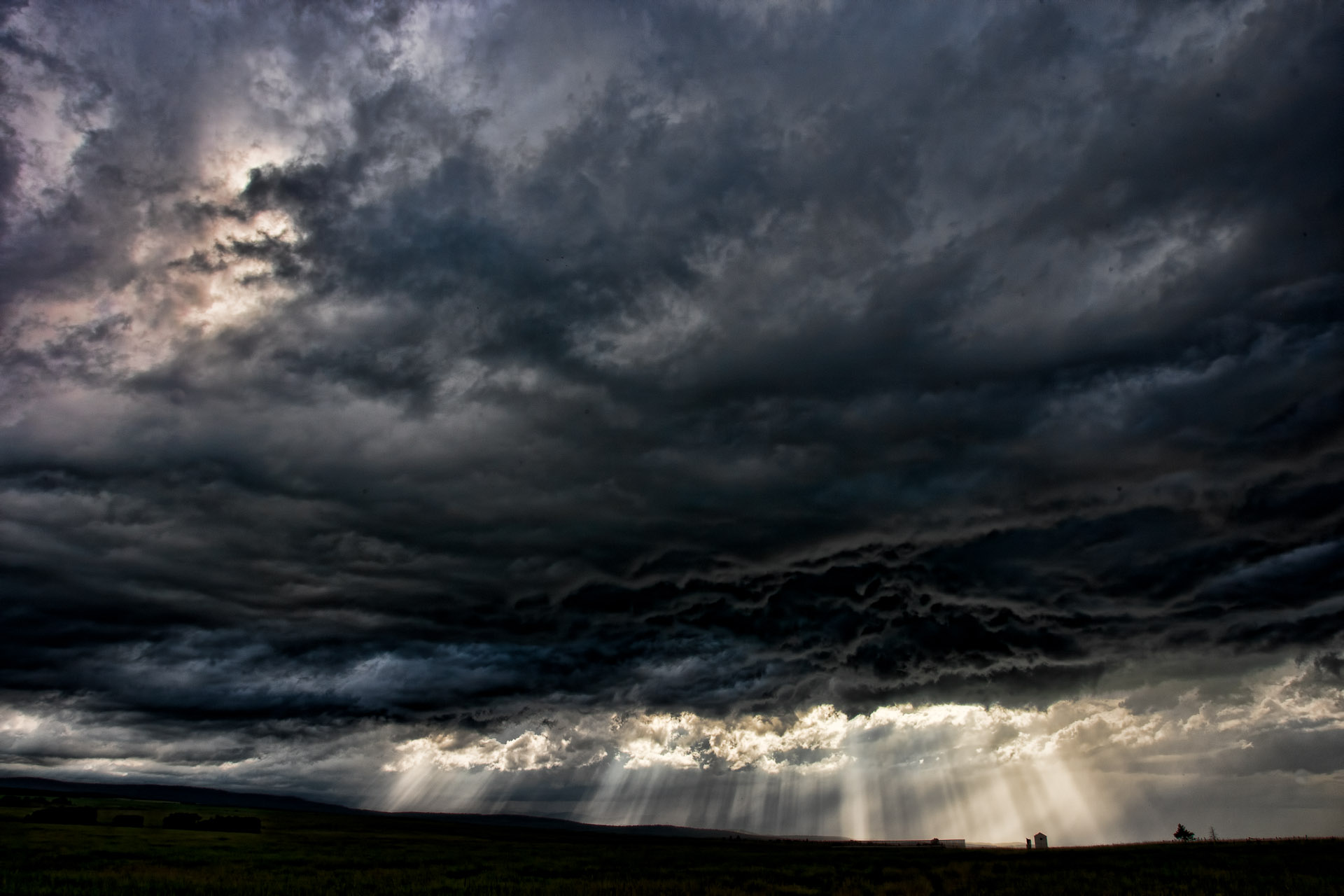 Prairie Storm Dark Clouds Heavy Rain And A Lightning Strike