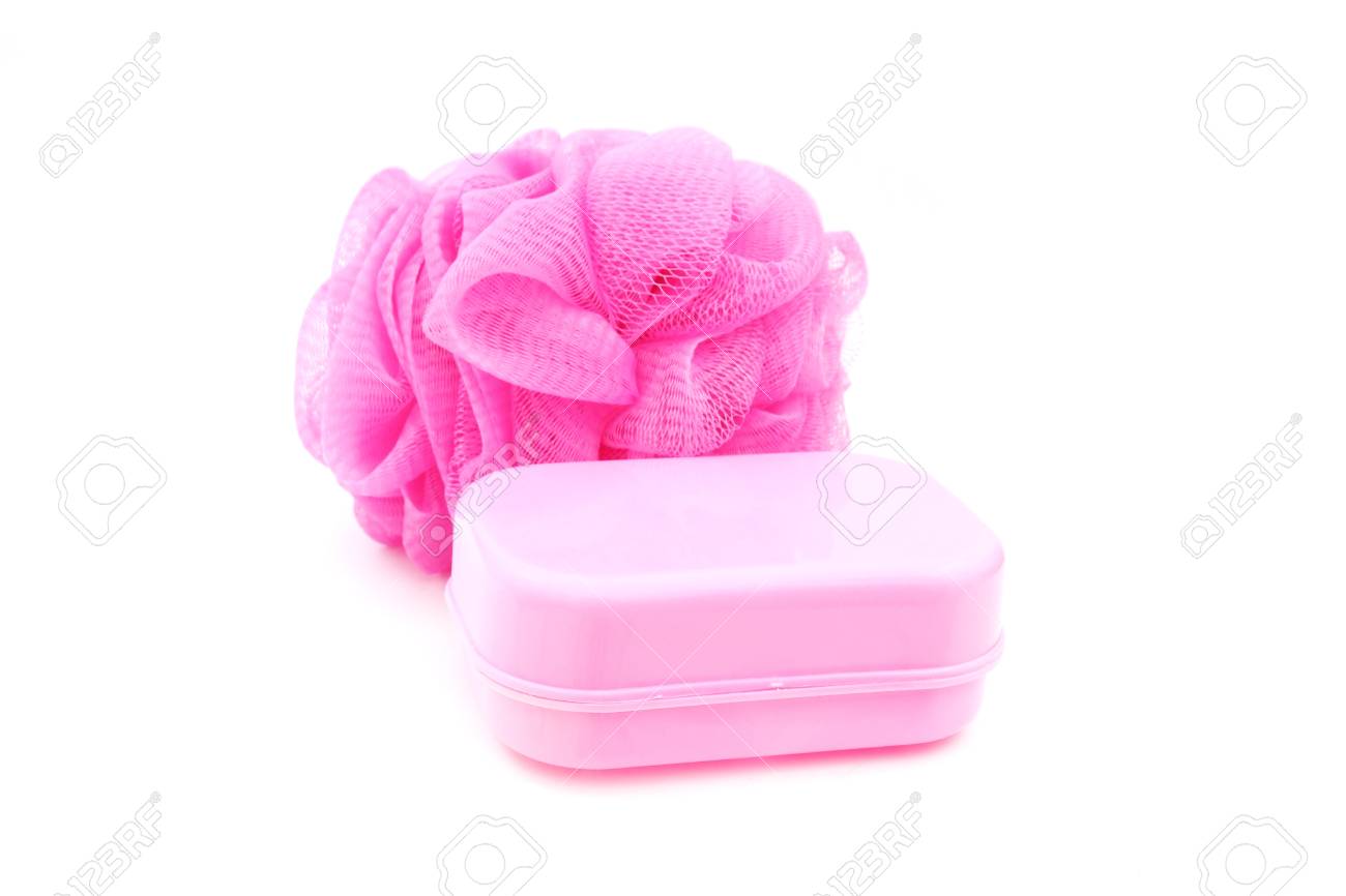 Pink Soapbox And Shower Scrubber On White Background Stock Photo