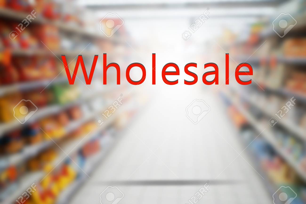 Word Wholesale On Blurred Supermarket Background Stock Photo