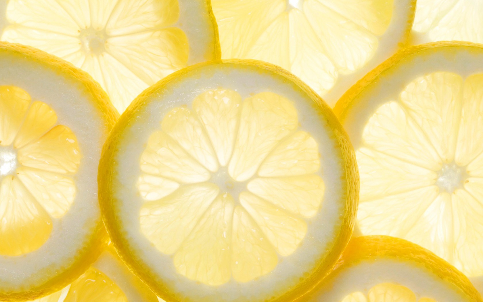 Texture Background With Citrus Fruit Of Lemon Slices