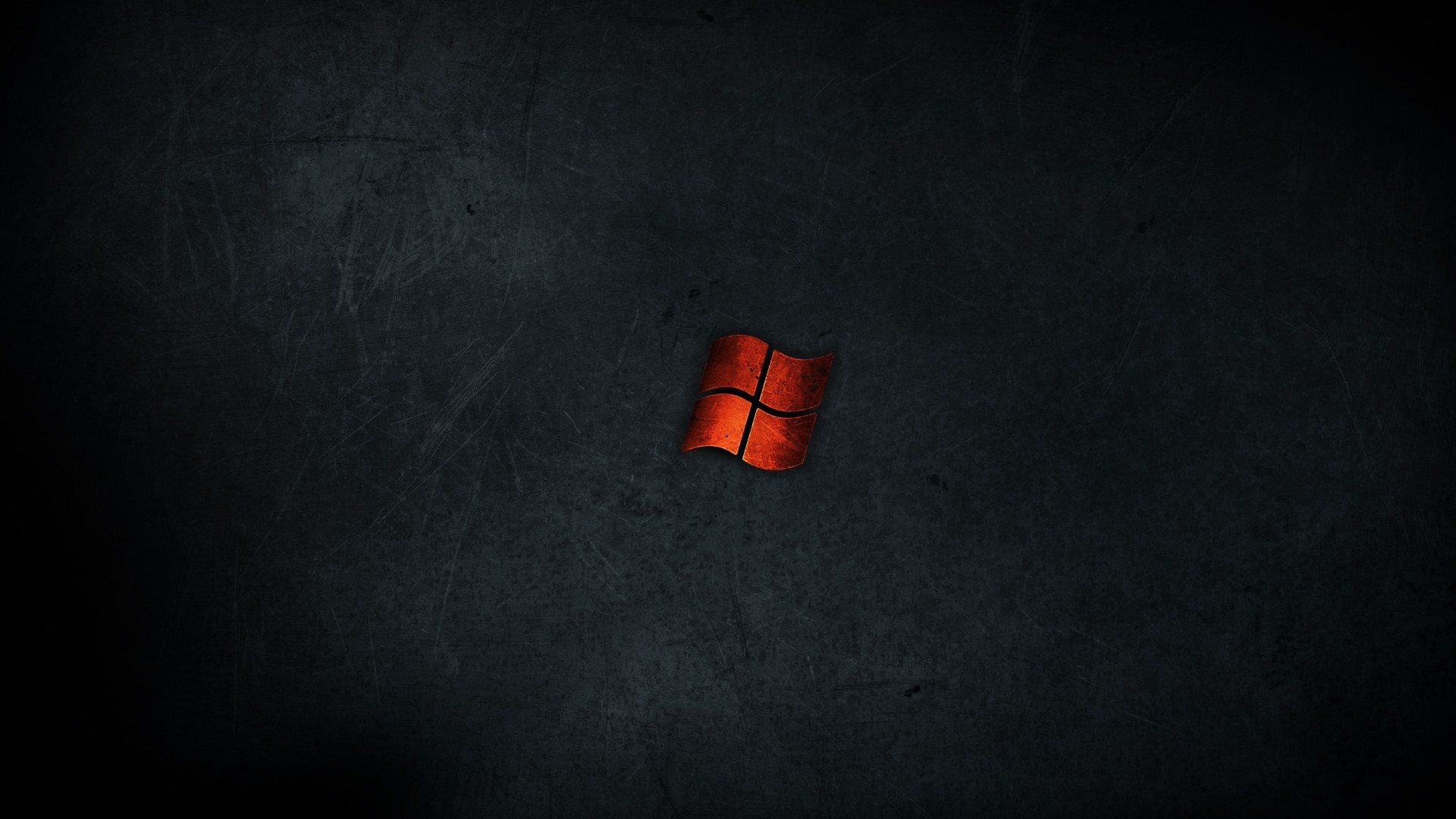 Dark grunge background with a glowing red Windows logo
