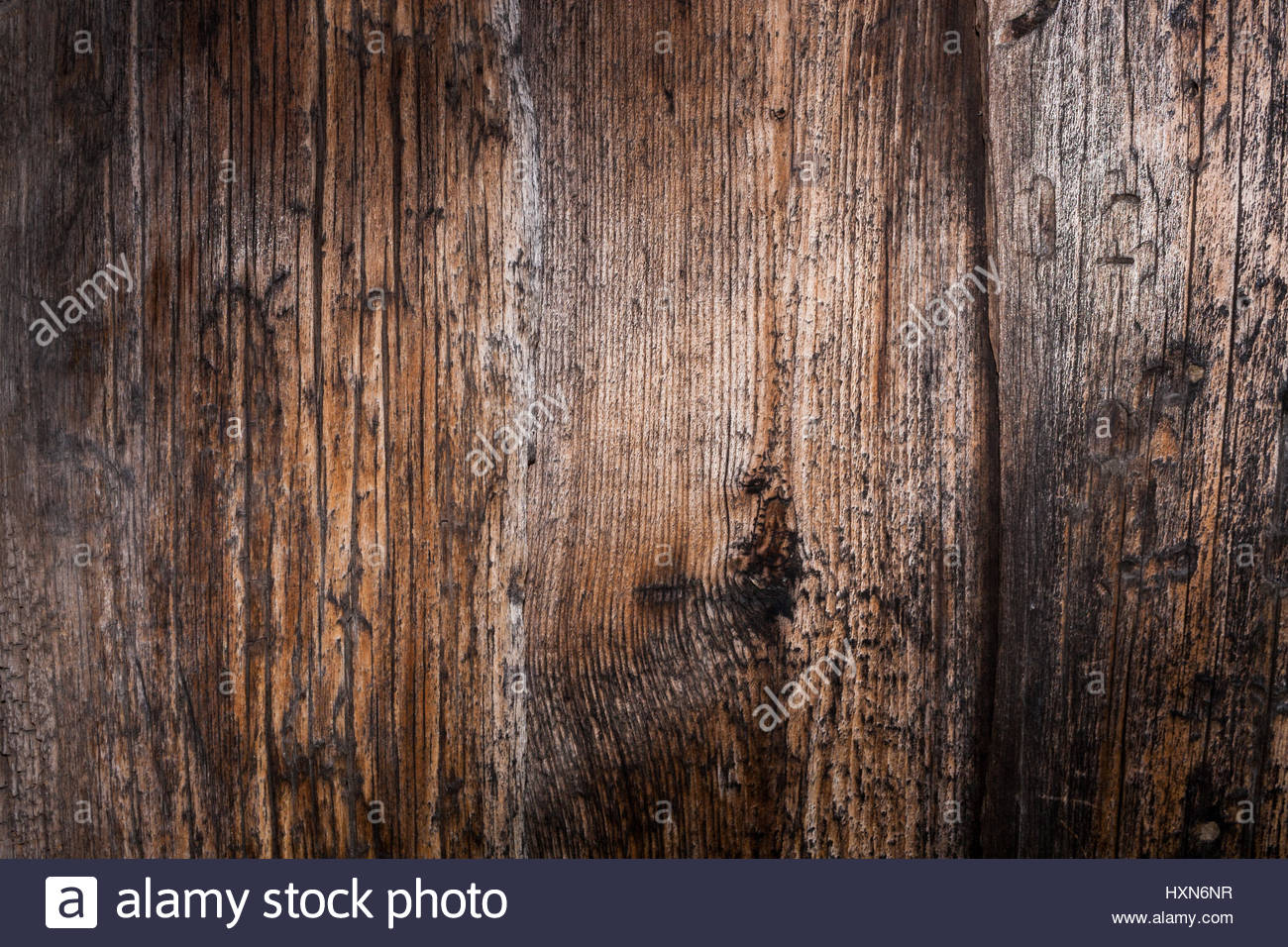Wooden natural background Wall of old wooden planks Well seen