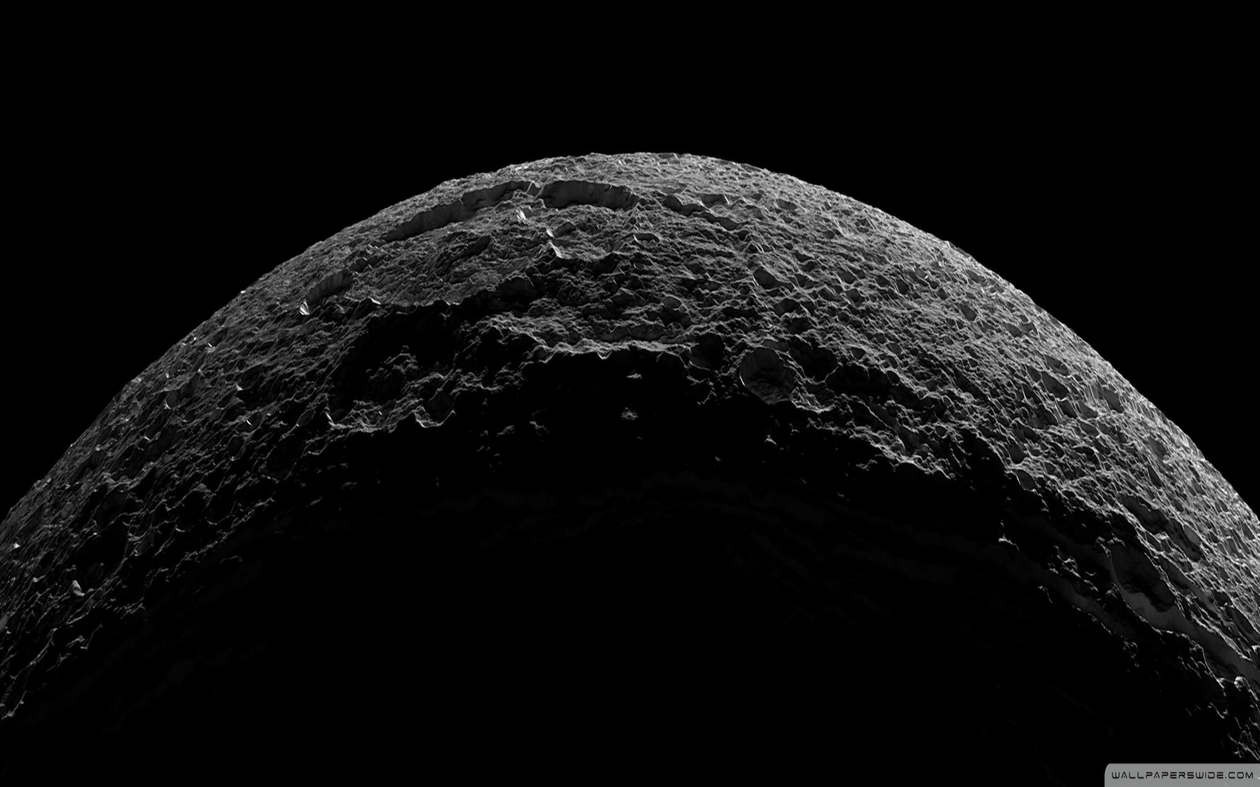 Close-up of a heavily cratered celestial body in space