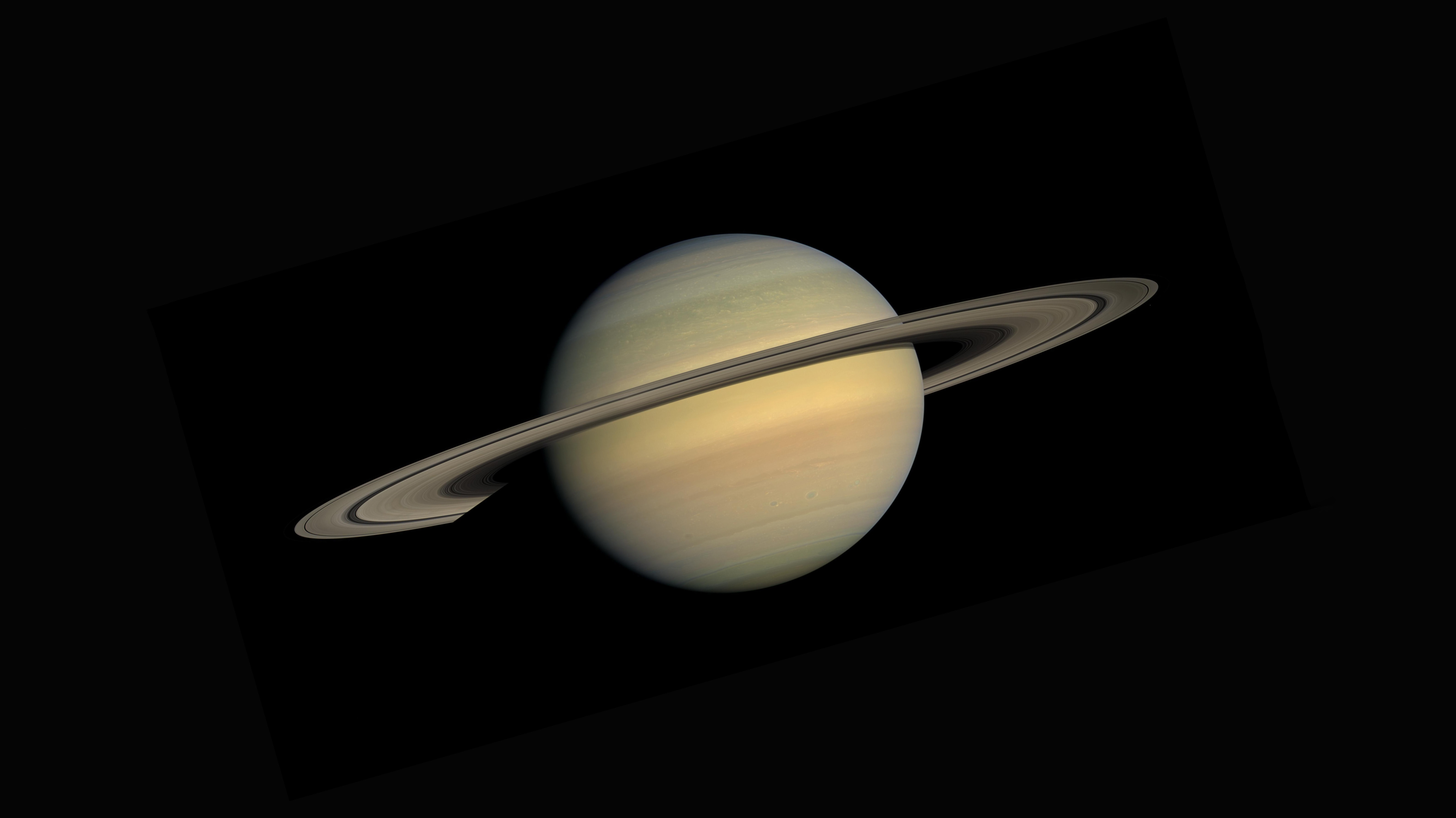 Saturn As Seen From The Cassini Huygens Space Research Mission Wallpaper