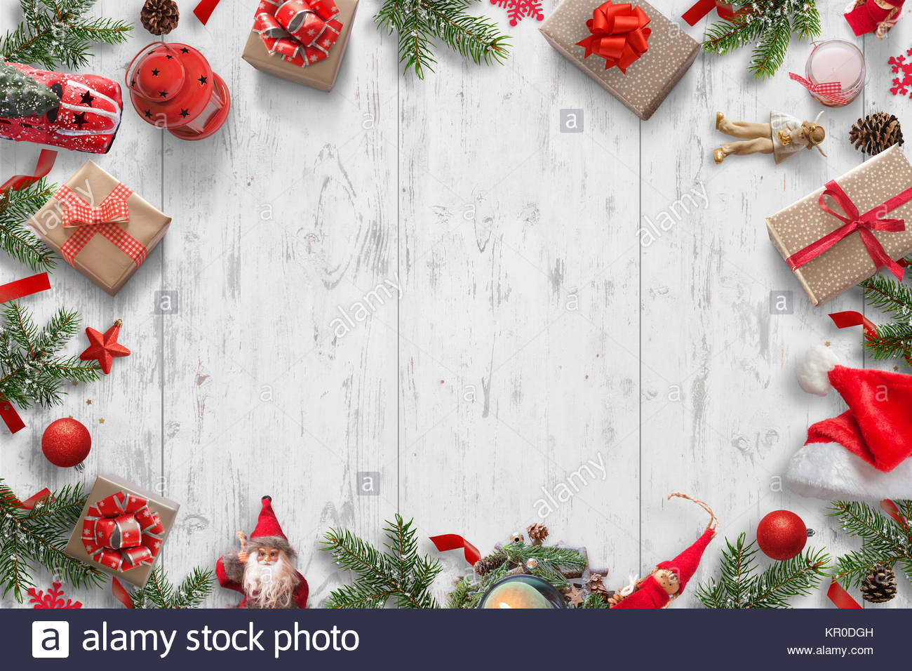 Christmas background on white wooden desk with Christmas tree