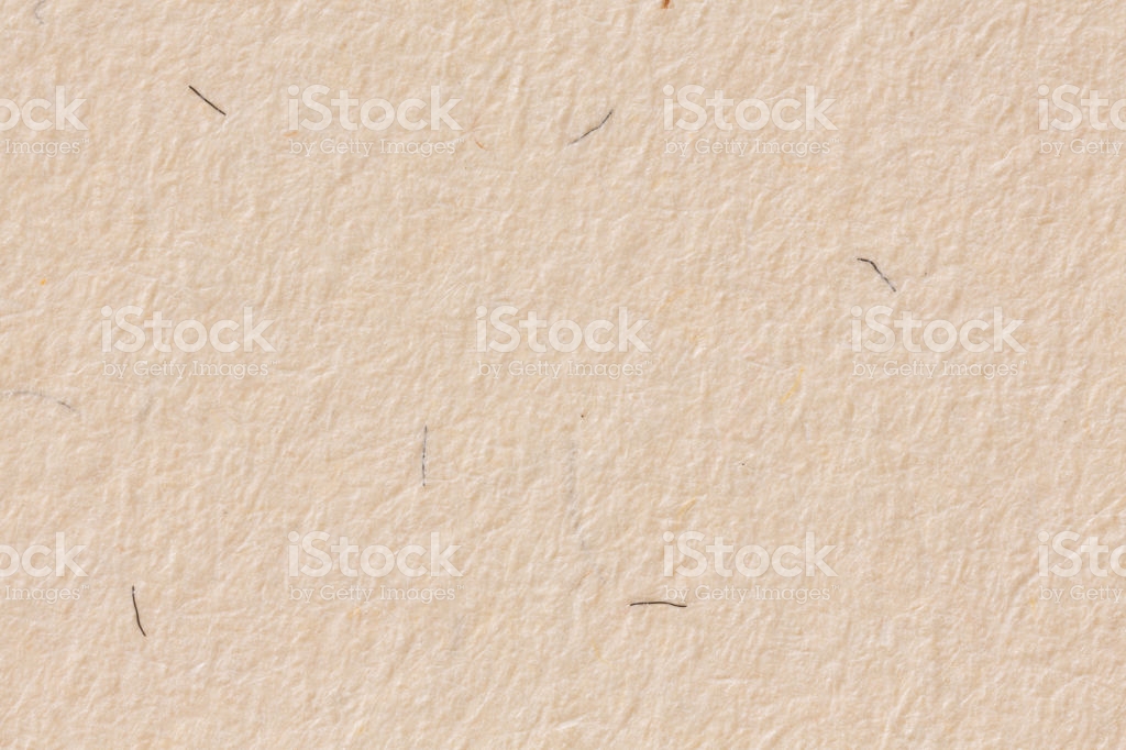 Close Up Of Warmtoned Offwhite Paper Background Stock Photo