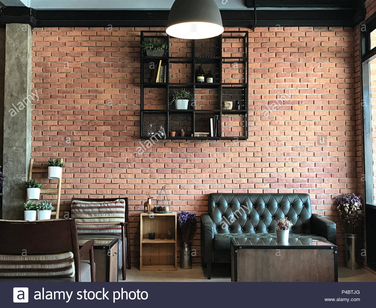 Vintage Room With Sofa Set Brick Wall Background In The Cafe